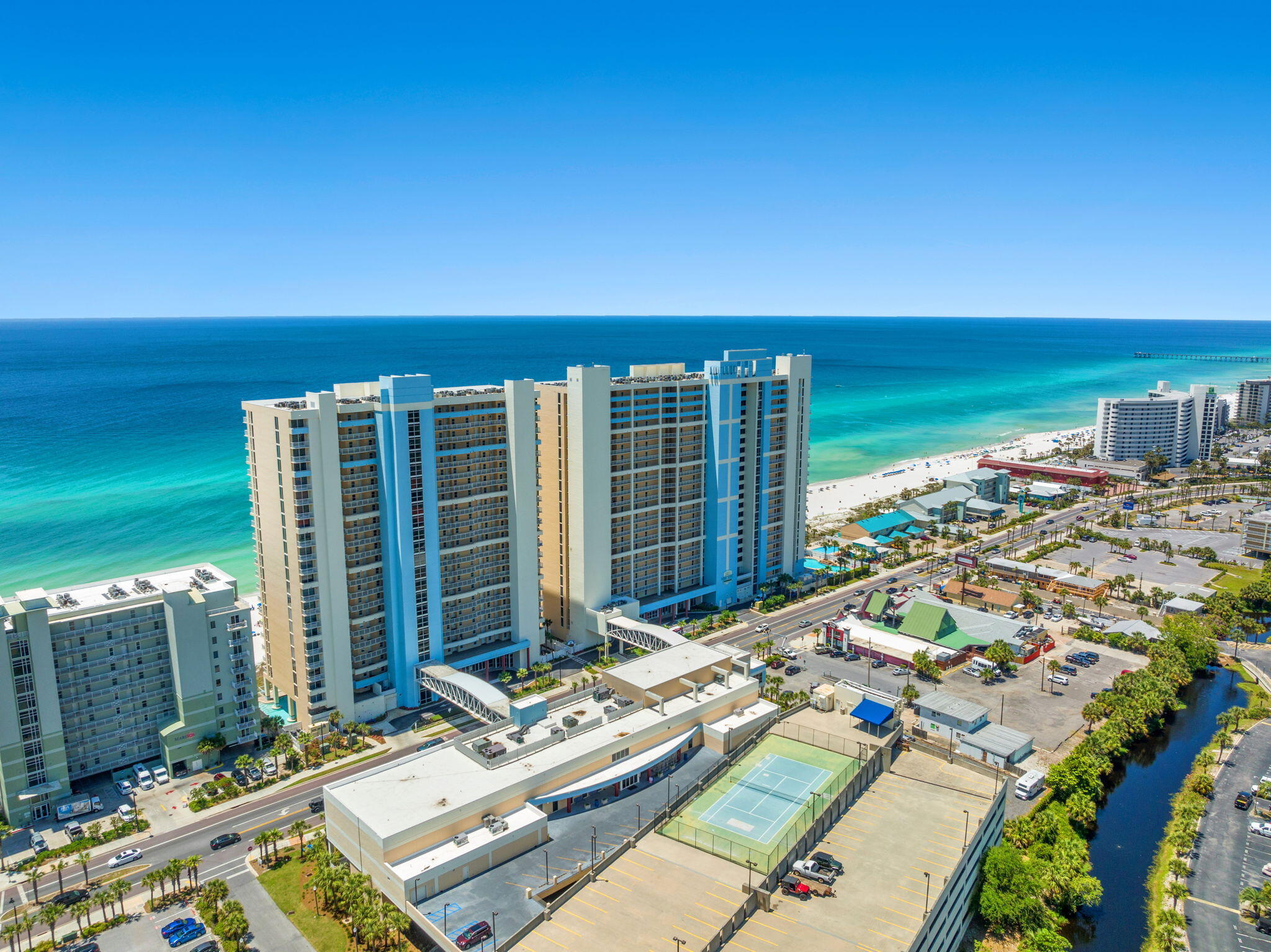 Gulf-Front Luxury with Endless Amenities: Experience the best of Panama City Beach from Majestic Beach Resort Unit 1906, a beautifully updated one-bedroom, two-bath condo with breathtaking Gulf views. Perched on the 19th floor, this coastal retreat is designed for up to four guests, offering the perfect blend of comfort and style. The private bedroom features a king bed, while a built-in bunk nook adds extra space for family or friends.Step out onto the private balcony and take in sweeping views of the Gulf, perfect for enjoying outdoor dining as the sun sets. Inside, the open living space is filled with natural light, complemented by a fully equipped kitchen with full-size appliances and a dishwasher. Two bathrooms, an in-unit washer and dryer, high-speed Wi-Fi, and a Smart TV ensure every convenience is at your fingertips.
Majestic Beach Resort is packed with amenities, including five swimming pools, three hot tubs, and 650 feet of sugar-white sand beach with direct access. Guests also enjoy a fitness center, movie theater, tennis and pickleball courts, a game room, and multiple on-site dining options, from a Starbucks caf?? to a seasonal poolside grill. Covered parking, lightning-fast elevators, and 24/7 security ensure a stress-free vacation home from start to finish.
Centrally located near Pier Park, Aaron Bessant Park, and some of the area's best restaurants and shopping, Majestic Beach Resort 1906 offers the ultimate combination of location, amenities, and Gulf-front living!