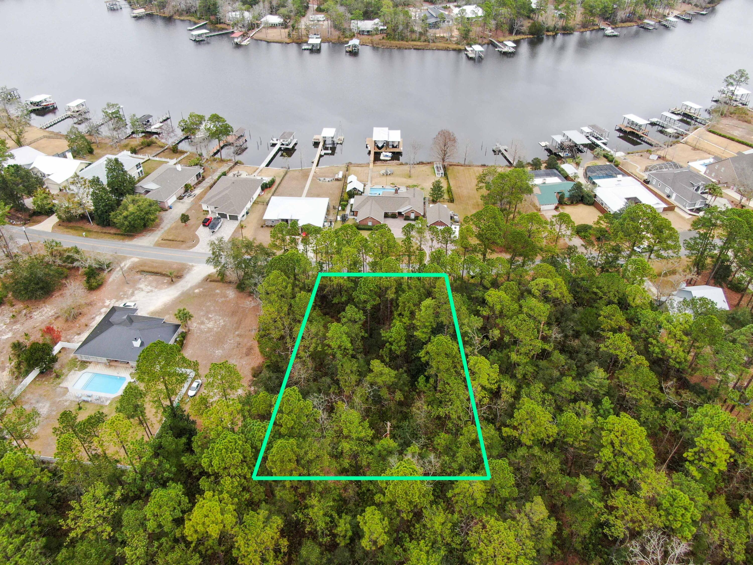 Very nice lot in Bay Grove/Mallet Bayou area. Very few lots left in this popular Freeport neighborhood. Lot, located just across the street from the water is entirely in flood zone ''X''. Close to Hwy 331, 30A, new park and boat ramp. No HOA. Interior lots in this neighborhood very rarely come available. Great opportunity! Boundary survey available (2011). (Please verify any important details, information taken from public records.)