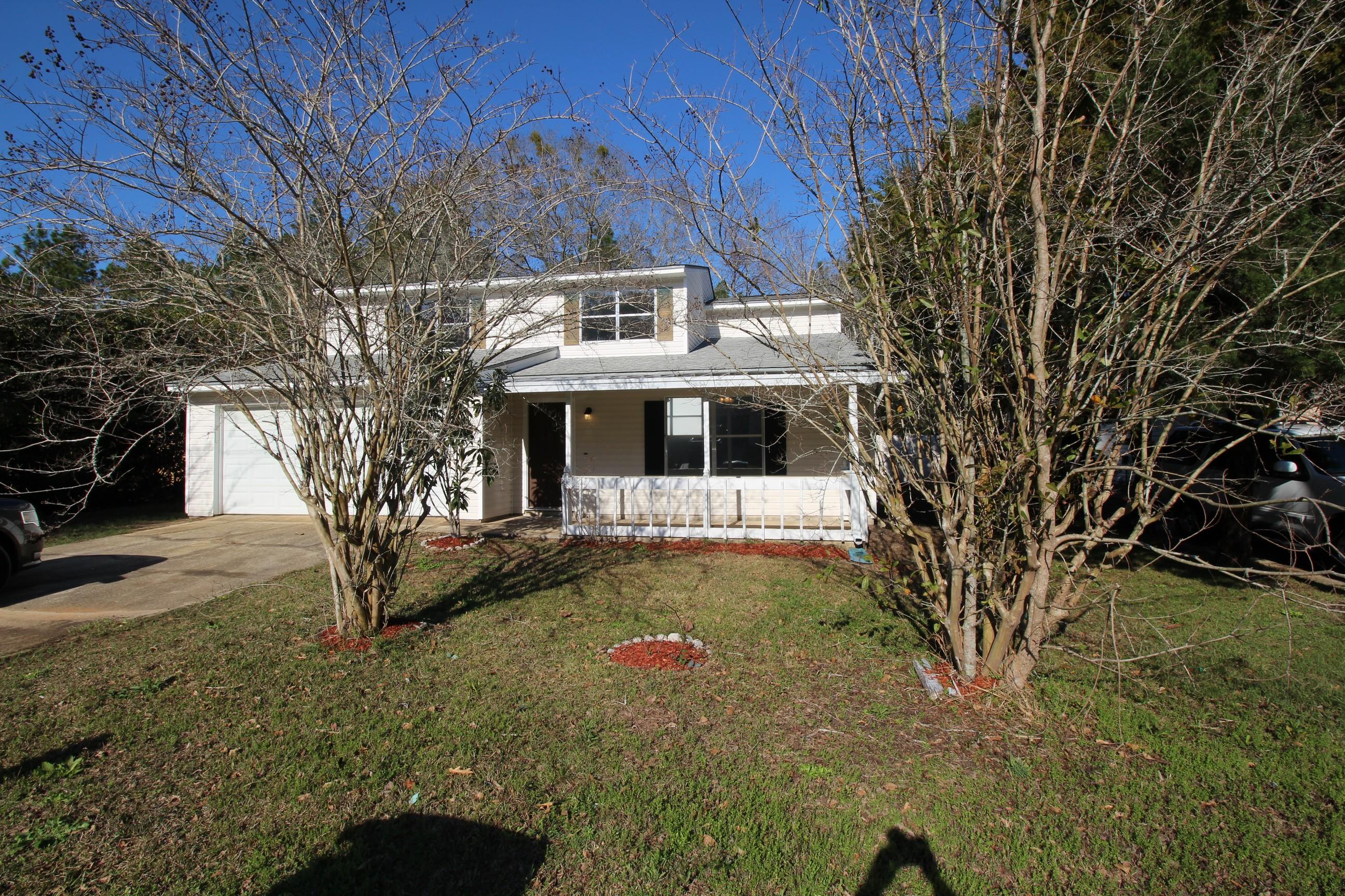 REMODELED 4 BED 2 BATH 2 CAR GARAGE HOME READY TO MOVE IN!!! With New Paint Inside & Out, New Kitchen Granite Countertops, New Stainless Steel Appliances, New Carpeting, New Wood Laminate, New Lighting & Fans, New Outside AC Unit, Updated Bathrooms, HUGE Fenced Yard Peaceful & Private with NO Rear Neighbors! There is no honey do list, just move in and relax. Don't hesitate on this exceptional opportunity!