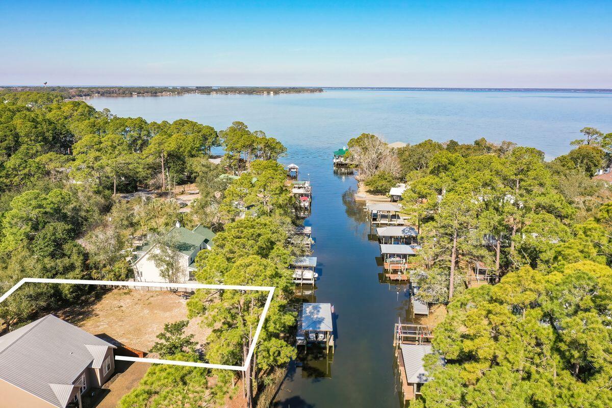 75 foot wide Canal front lot with seawall, boat dock and lift. Enjoy the coveted South Walton lifestyle at this highly desirable location within a golf cart ride of restaurants, shopping, and immediate boating access to the Choctawhatchee Bay.