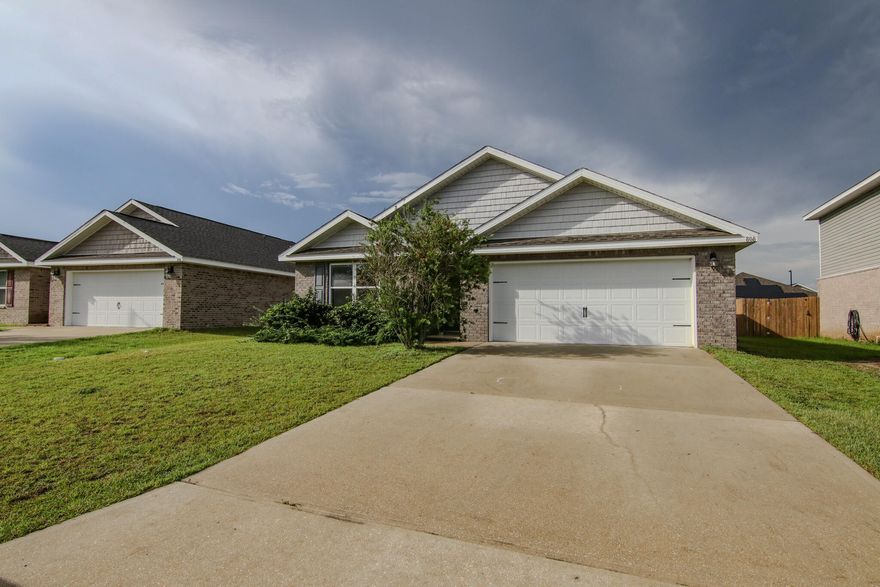 Welcome to your all brick, 4 bedroom home with open concept and split floor plan. VA Assumable loan at 5.5% interest rate with low equity. Built in 2019, not in a flood zone and underground utilities equals low home owners insurance. Enjoy a community dog park, pool, playground and large upscale pavilion equipped with open air kitchen and seating for 40. Entertain poolside or in your large open living and dining area that leads out to a fenced back yard. Kitchen has stainless steel appliances, a large pantry and granite island and countertops. Quick move in possible. Seller has a survey and providing a home warranty for peace of mind. Near Duke Field, Hwy 10, trendy eateries, malls with EV hookups and the medical area. Welcome to The Emerald Coast.