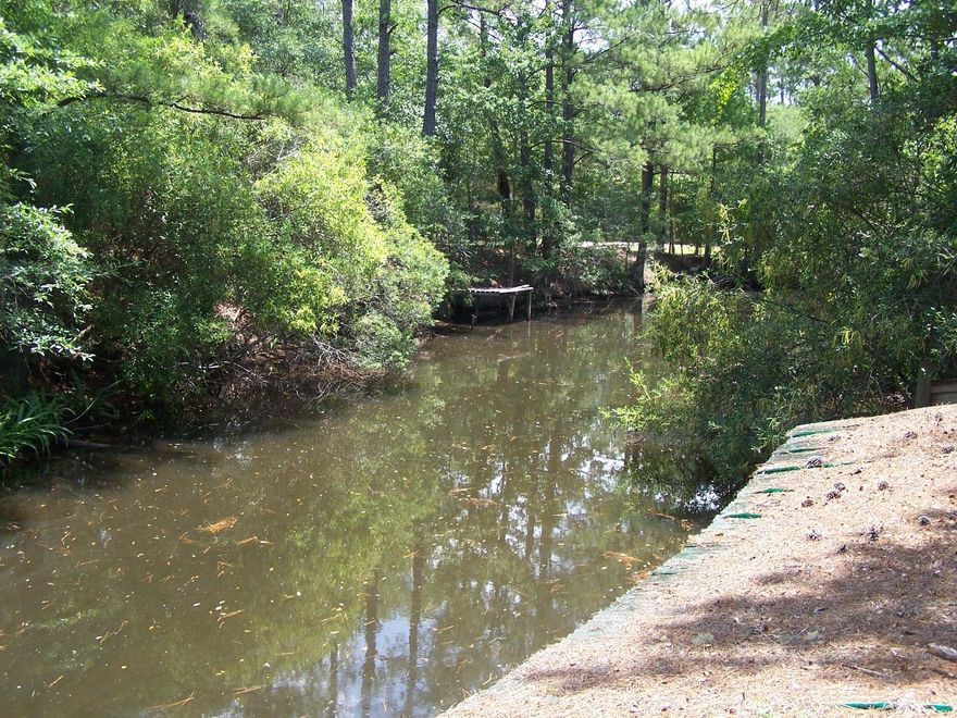 Build your waterfront dream home on this half acre of canal front property just a short boat ride from the Bay. Lots 2 & 3 back up to a canal, which is an ''L'' shape, the canal makes a 90 degree turn just past lot 2, and lot 1 is the canal itself, and also runs just north of the canal. When driving into the property, you will dead end at an unused boat ramp, this ramp can be restored to working condition, there is also a boat house and small dock on the property.