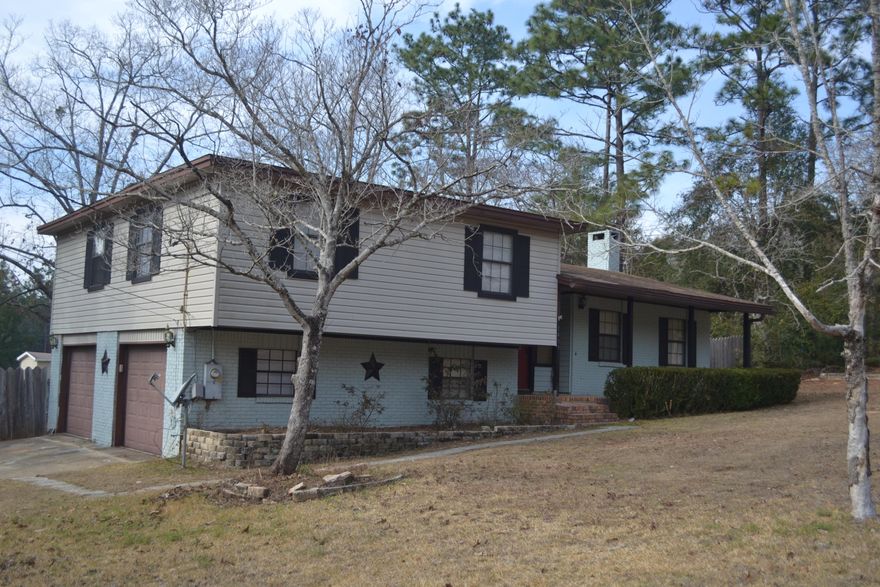 This 3 bedroom 2 bathroom home is ready for new owners and some Chip and Joanna Gaines inspired flair! Split level design separates the bedrooms from the main living area allowing for a more open floor plan. There is a bonus room next to the large garage -perfect to use as an office or game room! This home is situated on a very large corner lot (.66 acres) giving you plenty of room to play. The Grandview Heights community offers 4 lakes and a 5 acre lakefront park!