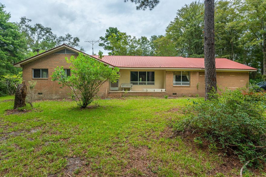 Great opportunity to make a dream become your reality! Sellers plans changed and this GREAT DEAL is yours to grab up! Located just outside of Florala with easy access to Andalusia as well as Crestview along with Eglin AFB this property is a paradise waiting for its new owners! Sitting on over 11 acres, this property offers hunting, two amazing pond that abounds with wildlife, blueberry, apple, peach, and pear trees along with grapevines! Tons of privacy welcomes you with a wooded canopy drive to home. Home offers 3 bedrooms, 2 full baths, a large laundry, formal dining, living room with fireplace, as well as family room. Home has been taken down to studs and is ready for you to make it your own! Property also offers a large barn as well as a covered enclosed in ground pool with bath.