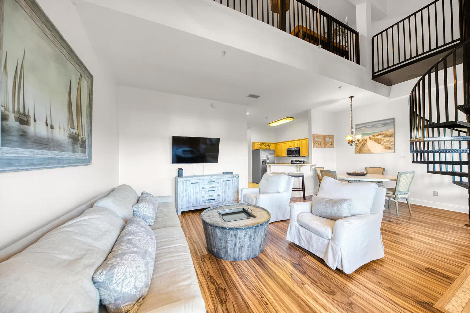 If you are someone who likes to be in the middle of what's happening, then you are going to love this condo! This condo is all about convenience and location and is located in The Plaza of Destin, a low-rise building with mixed retail on the lower level. This condo is super convenient to Destin Commons, Whole Foods, the Legendary Marina, lots of restaurants, and of course our beautiful beaches! This condo has a showstopping entrance with high ceilings, open floor plan, and spiral staircase. There are 2 master suites - one upstairs and one downstairs. There is also a bonus bunk room upstairs that works great for weekend guests. Condo is turnkey and fully furnished. No shortage of parking exists here at this condo building.