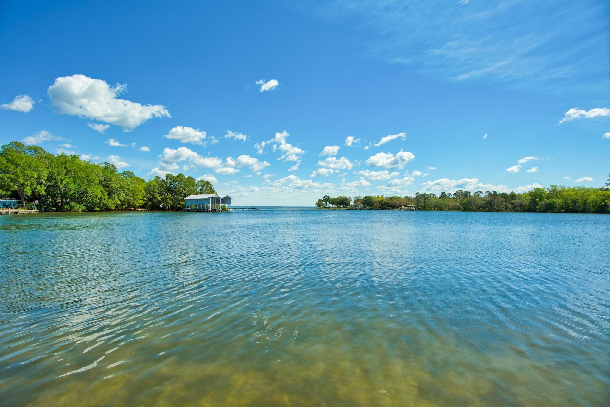 LAST WATERFRONT LOT in Sacred Oaks. Beautiful DEEP WATER lot on Mack Bayou with direct access to Choctawhatchee Bay. Sacred Oaks is an established waterfront community. Imagine building your dream home on this high and dry lot with seawall. No buildout time. Sacred Oaks offers low HOA fees and easy access from the community dock or BUILD YOUR DOCK along your 45 feet of waterfront! Conveniently located near Sacred Heart Hospital, Grand Boulevard and the beautiful beaches of South Walton and 30A. All measurements are approximate and buyer to verify.
