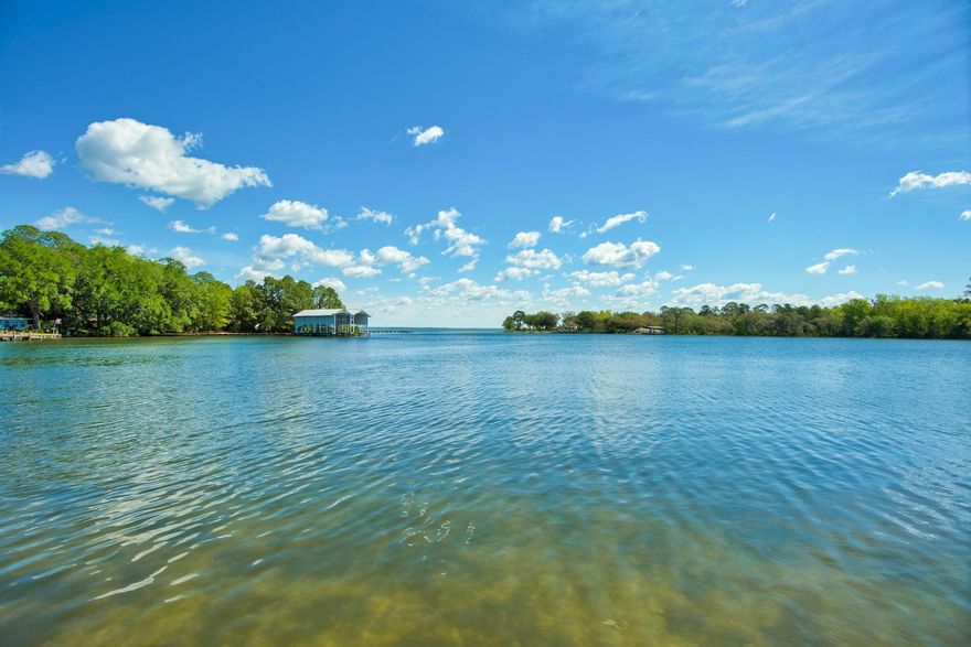 LAST WATERFRONT LOT in Sacred Oaks. Beautiful DEEP WATER lot on Mack Bayou with direct access to Choctawhatchee Bay. Sacred Oaks is an established waterfront community. Imagine building your dream home on this high and dry lot with seawall. No buildout time. Sacred Oaks offers low HOA fees and easy access from the community dock or BUILD YOUR DOCK along your 45 feet of waterfront! Conveniently located near Sacred Heart Hospital, Grand Boulevard and the beautiful beaches of South Walton and 30A. All measurements are approximate and buyer to verify.