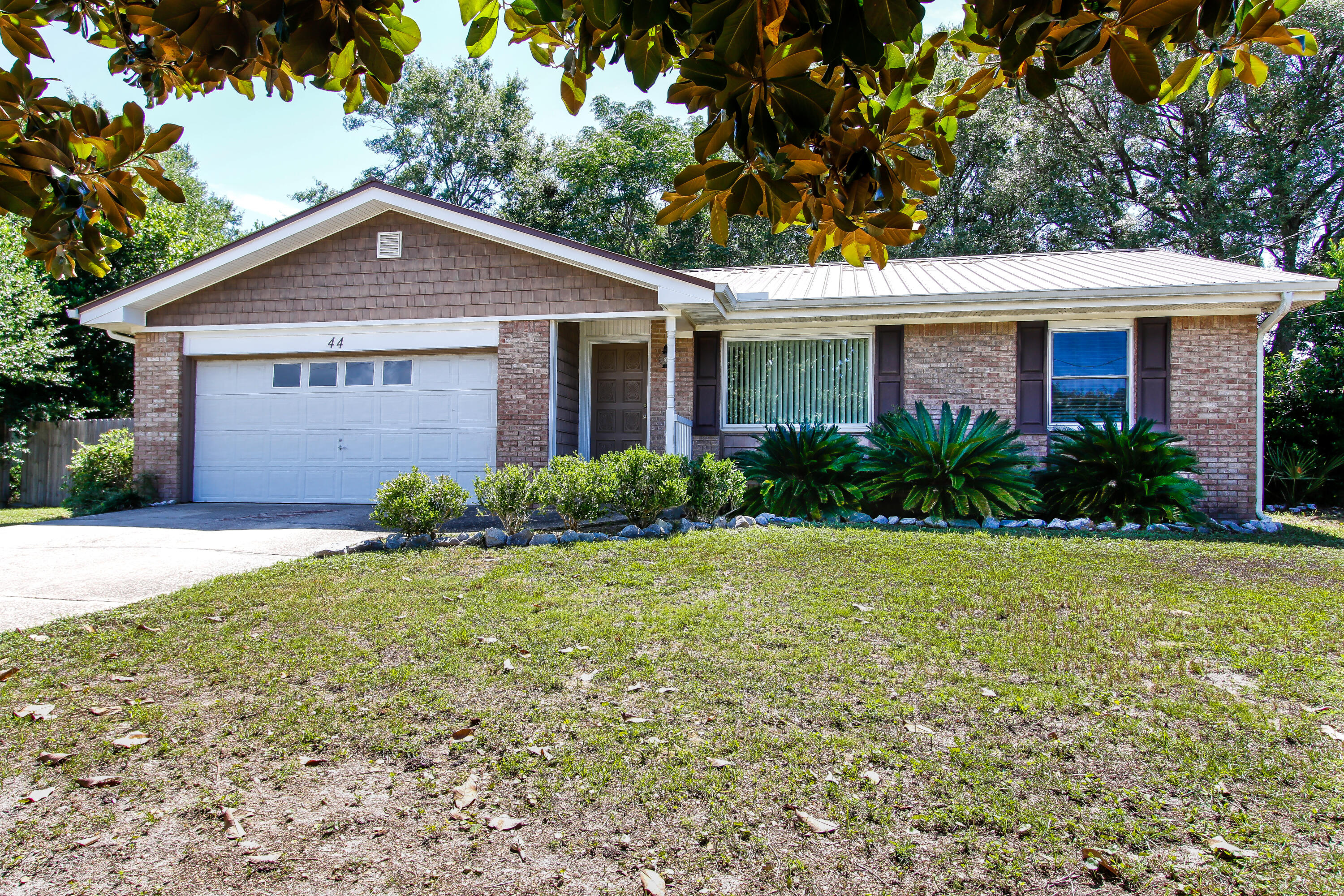 Avail: 4/25. Sec Dep = $2,100 - can be broken up in 2 monthly installments if qualified. 1 small pet okay w/ owner approval & a pet fee. All brick 3 bedroom, 2 bathroom, 2 car garage home in the heart of Port Dixie in Shalimar. Close to schools, churches, shopping, parks and both bases. Home has a metal roof (2011). Total remodel in 2019 to include: HVAC system, house rewire to copper, water heater, flooring, paint & windows. Newer kitchen with loads of cabinets, pantry and pretty granite countertops. Stainless appliances. Newer bath vanities and fixtures. Nice size privacy fenced backyard with a large yard building great for storage or a work shed. Home has a sprinkler system and well on timer for easy yard maintenance. Welcome home!