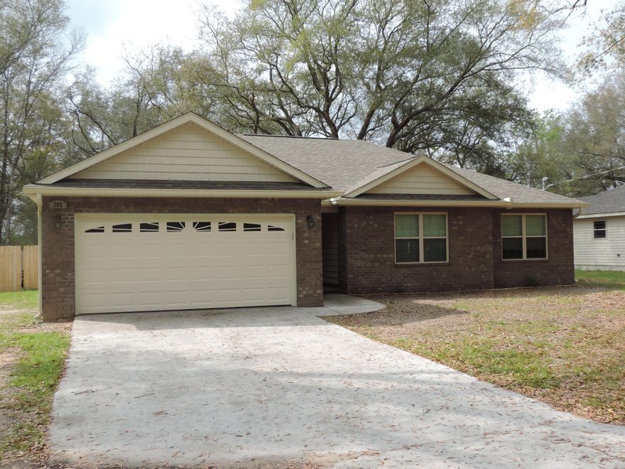 Less than two years old!! Close in location only minutes from Duke, 7th SFG, and Eglin Military Bases. Featuring a split bedroom plan this home feels larger than its actual size. The kitchen has beautiful espresso finished cabinets all with soft close drawers and doors and stainless appliances. The master bedroom is oversize allowing plenty of room for large furniture. and has a spacious walk in closet. The bedrooms all have upgraded carpet and pad, all wet areas have tile and a wood floor flows through the large living room and hallways. This home is a must see, close in, with privacy fence, blinds, everything you usually have to buy extra is already installed. Less than two years old. Put this on your list today.