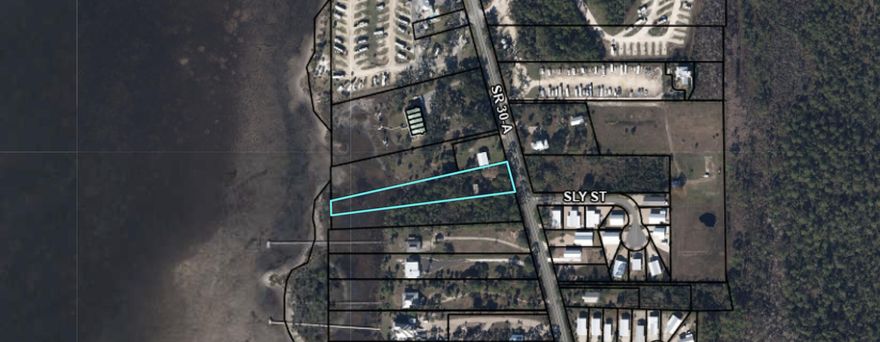 Rare Waterfront Opportunity!Discover an extraordinary opportunity to own a stunning waterfront lot in the Port Saint Joe area. This 1.44-acre property offers serene water views and unparalleled privacy, making it the perfect canvas for your dream home, vacation retreat, or investment property.Situated in a prime location along CR 30A, this lot combines convenience and tranquility, just minutes from the Gulf's pristine beaches, local dining, and recreational opportunities. With its generous size and prime waterfront access, it's a truly rare find in today's market. The sellers are motivated, presenting a unique chance for a buyer ready to move quickly and secure this exceptional property. Opportunities like this don't come around oftenact now to make this waterfront gem yours!