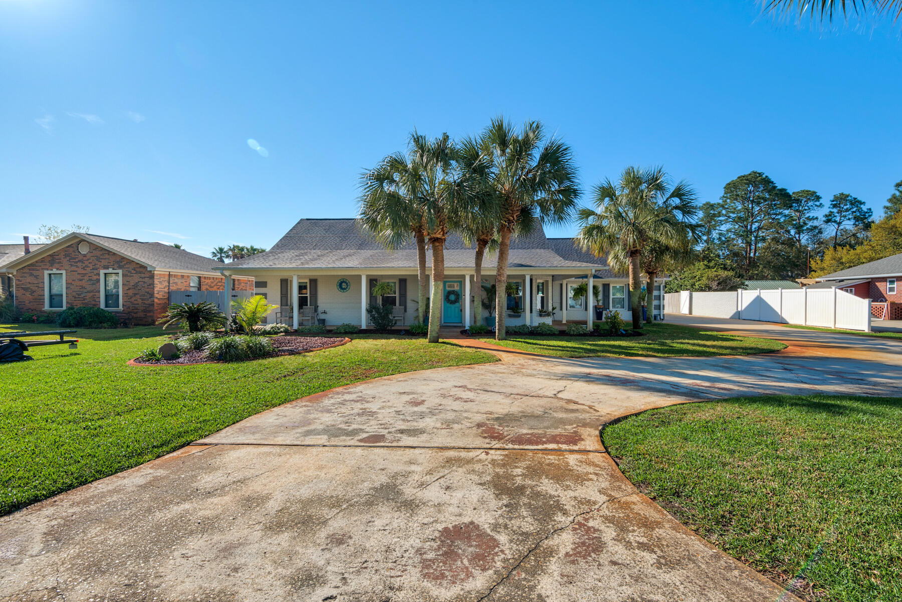 Nestled in the sought-after Polynesian Isles neighborhood, this canal-front property offers a rare blend of luxury, privacy, and functionality. Featuring a boat lift, new dock, boat lift cover, private boat ramp, and screened-in in-ground pool, it's perfect for boating enthusiasts and those craving a waterfront lifestyle. Inside, an open floor plan awaits, ideal for entertaining. This four-bedroom, three-bath home includes two canal-front master suites with custom closets and stunning views. The entire home is free of carpet, showcasing new luxury vinyl flooring throughout. The bright kitchen features white shaker cabinets and dolomite stone countertops, while the formal dining room offers a great space for guests. The spacious family room includes an electric fireplace and built-in TV unit. All three bathrooms have been fully renovated with elegant tile work, glass shower doors, new vanities, and modern fixtures. The master bath boasts an oversized shower with dual shower heads. The home is equipped with two new energy-efficient gas tankless water heaters and features a new roof and skylights (2021), an upgraded HVAC system (2017), and hurricane-rated windows, doors, and garage (2022). An Insurance Mitigation Report is available.
The backyard is a private oasis with a resurfaced pool deck, freshly painted surfaces, and a pool liner replaced in 2018. The Polaris pool cleaner was updated in 2021, and a new garage door opener was installed that same year. In 2023, a new hot tub with cover, stairs, and hydraulic lift was added. A covered gazebo completes the outdoor space, perfect for dining and relaxation. The home also features a new vinyl, chain-link, and pressure-treated wood fence, offering total privacy. Additional upgrades include natural gas connections (2022) for the stove, water heaters, pool heater, and generator, plus a new irrigation well pump using reclaimed water.
This meticulously maintained home, with over $300K in recent upgrades, is move-in ready and promises an exceptional living experience.
