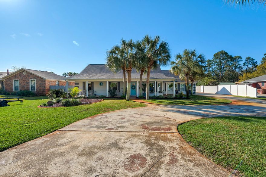 Nestled in the sought-after Polynesian Isles neighborhood, this canal-front property offers a rare blend of luxury, privacy, and functionality. Featuring a boat lift, new dock, boat lift cover, private boat ramp, and screened-in in-ground pool, it's perfect for boating enthusiasts and those craving a waterfront lifestyle. Inside, an open floor plan awaits, ideal for entertaining. This four-bedroom, three-bath home includes two canal-front master suites with custom closets and stunning views. The entire home is free of carpet, showcasing new luxury vinyl flooring throughout. The bright kitchen features white shaker cabinets and dolomite stone countertops, while the formal dining room offers a great space for guests. The spacious family room includes an electric fireplace and built-in TV unit. All three bathrooms have been fully renovated with elegant tile work, glass shower doors, new vanities, and modern fixtures. The master bath boasts an oversized shower with dual shower heads. The home is equipped with two new energy-efficient gas tankless water heaters and features a new roof and skylights (2021), an upgraded HVAC system (2017), and hurricane-rated windows, doors, and garage (2022). An Insurance Mitigation Report is available.

The backyard is a private oasis with a resurfaced pool deck, freshly painted surfaces, and a pool liner replaced in 2018. The Polaris pool cleaner was updated in 2021, and a new garage door opener was installed that same year. In 2023, a new hot tub with cover, stairs, and hydraulic lift was added. A covered gazebo completes the outdoor space, perfect for dining and relaxation. The home also features a new vinyl, chain-link, and pressure-treated wood fence, offering total privacy. Additional upgrades include natural gas connections (2022) for the stove, water heaters, pool heater, and generator, plus a new irrigation well pump using reclaimed water.
This meticulously maintained home, with over $300K in recent upgrades, is move-in ready and promises an exceptional living experience.