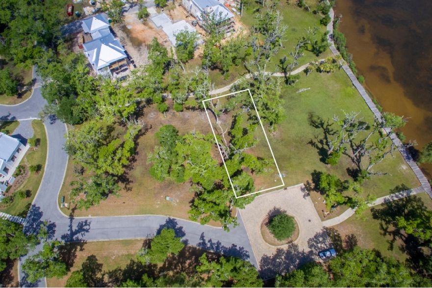 Here is an excellent opportunity to build your custom home surrounded by some of South Walton's most beautiful scenery including envious bay views. Churchill Oaks is a gated community situated on 40 acres along Choctawhatchee Bay. Private and serene, discover a Florida lifestyle like no other. Mature landscaping, such as Southern magnolias, and live oaks provides a natural setting with half of the development remaining virtually untouched creating a timeless and nostalgic atmosphere. Enjoy sailing, wakeboarding, water skiing, kayaking and more along the Bay, or perhaps spend a day at one of the popular white sandy beaches, only a few miles away. Wold class golfing, upscale dining and shopping are all nearby, making this community the ultimate paradise in which to live.