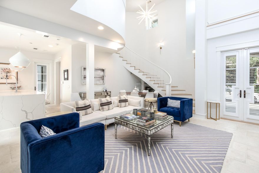 This spectacular contemporary residence is perfectly situated on a coveted oversized corner lot in beautiful Rosemary Beach. High-quality construction is apparent upon entering an inspiring great room with two-story soaring ceilings, a feature fireplace, and a winding staircase. Designer lighting fixtures can be found throughout this 3,322 sq ft home. A gourmet kitchen features Wolf and Sub-Zero appliances, a Scotsman pellet ice machine, Cambria quartz countertops, and wood shaker cabinets with soft close doors and drawers. Double doors lead out to an exquisite private outdoor courtyard with beautiful landscaping, a large saltwater pool, outdoor fireplace, summer kitchen and water fountain and three outliving living spaces. Porches on the second floor offer serene places for relaxing....