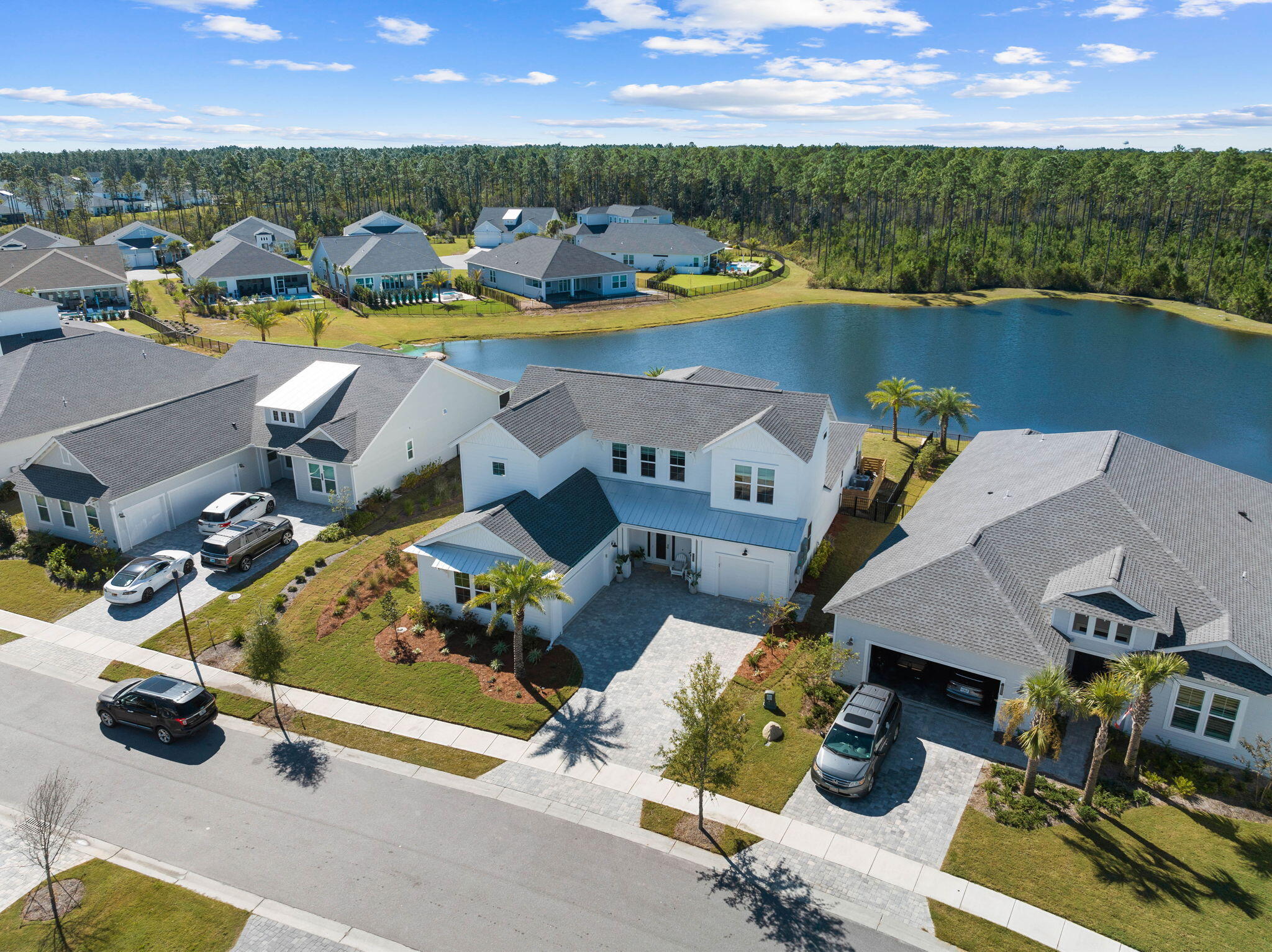 Discover the serenity of 30A, far from the tourist hustle and bustle.  This property is graced with a lakefront location, enhancing its scenic allure and providing wide-ranging views of the tranquil waters. Nestled in a secure, gated community just 5 minutes from Rosemary and Alys Beach, it offers convenience to the delightful shops and restaurants along 30A. Yet, it provides the luxury of seclusion in a well-established community focused on long-term residents, with no short-term rental properties. This thoughtfully designed home requires minimal maintenance, making it a perfect retreat for families needing space or grandparents hosting loved ones.