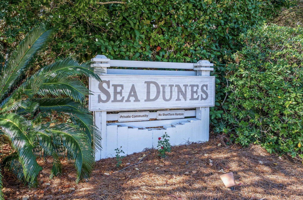 Location, Location! Sea Dunes community just a short walk or golf cart to the emerald Coast beaches.This homesite has fantastic walkability including shopping, restaurants, and Bars. This corner lot is perfect location to build your dream home. The friendly community has a few lots left and is a rental restricted community. The lot has its tap fee paid.