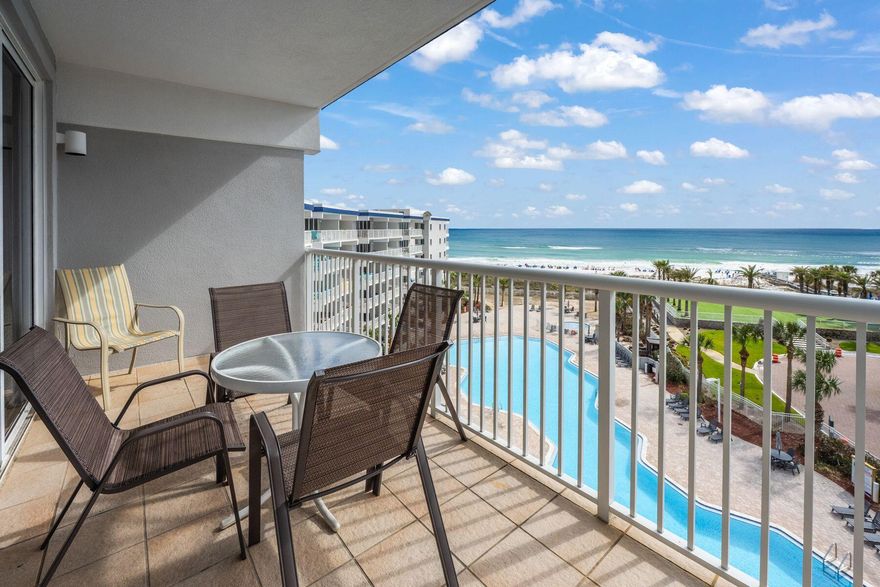Delivering the ultimate gulf views and an enviable beach-front lifestyle, this top-floor condo is superbly located within Destin West. Recently updated and offered for sale fully furnished, it has solid rental returns as an investment or vacation home. This one-bedroom unit is surprisingly spacious and comfortably sleeps six in the master bedroom, living room with queen sleeper sofa and built-in bunk beds in the hallway recess. There's a useful guest bath as well as an ensuite master bath. New wood-tile flooring and fresh paint are complemented by tasteful furnishings throughout. The all-white kitchen has ample storage and worktop space along with a handy breakfast bar for four. The furnished balcony provides a private sanctuary for reading and relaxing within sight and sound of the waves. Destin West is a world-class resort featuring 7 swimming pools including a heated pool for year round enjoyment and a 700' winding lazy river for relaxing under lush landscaping. A fitness center, full service beach rentals, a bayside marina/dock and children's play area, complete the resort's appeal.

