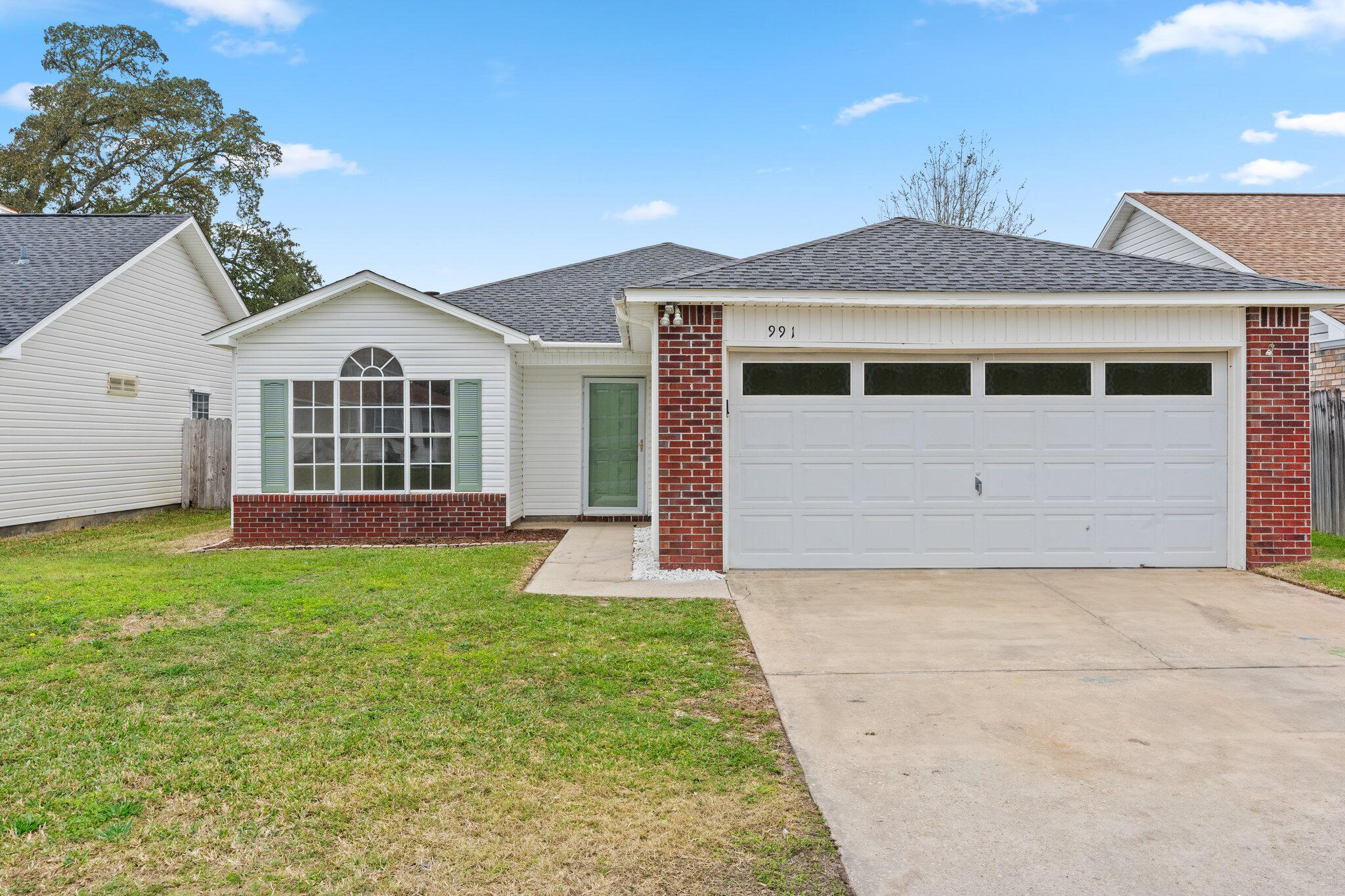 Seller is offering a $5,000 buyer credit with an acceptable offer, making this the perfect opportunity to call it your own!Welcome to 991 John Wayne, a charming home nestled in a quaint and peaceful neighborhood with quiet streets, offering a serene living experience. Centrally located, this property provides easy access to all that Florida has to offer while maintaining a sense of tranquility.This home has been completely renovated to offer a modern, coastal vibe with thoughtful upgrades throughout. A brand-new roof was installed in 2021, providing peace of mind for years to come. The interior renovation includes stunning new countertops, fresh paint, updated lighting, new flooring, stylish fixtures, and upgraded landscaping - all adding to the home's welcoming atmospher Enjoy cozy evenings by the fireplace, a perfect touch for those cooler Florida nights. The comfortable backyard provides a private retreat for outdoor relaxation and enjoyment.
Come experience the comfort, style, and charm of 991 John Wayne!