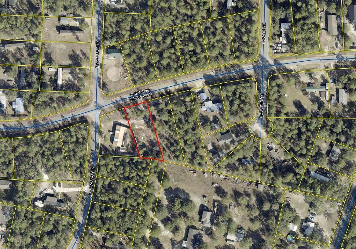 Looking to live near town but outside the city limit?? Take a look at this... Vacant cleared lot in an established neighborhood very convenient to town or for your commute. Power is in front of the lot, city water is available once tap fee is paid, and septic tank will be required. Culvert is already in place. BONUS: SELLER HAS A SURVEY! This lot is perfect to build a new home or place a manufactured home. Don't let this one get by!