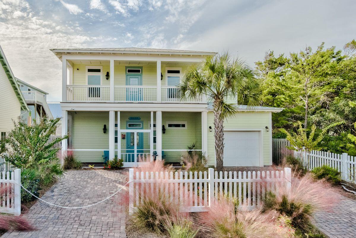 This amazing beach home is south of Scenic 30A and close to the beach access by Eastern Lake. The four-bedroom, three-and-a-half bathroom home has a garage, has never been a rental and is in excellent condition. The kitchen, living room and dining are all open with vaulted ceilings above. Ample sunlight fills the space and makes the first floor ideal for relaxing and family get togethers. There is a master bedroom with full bathroom on the first floor as well. The kitchen has modern appliances, granite countertops and custom cabinets. The front of the home has two parking spaces in addition to the garage and a screened porch. A half bathroom by the front door and laundry room complete the first level. This beach home was custom built and has lots and lots of storage!
