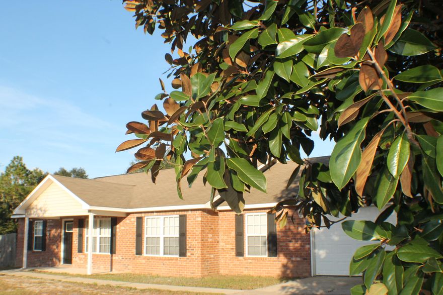 Paved road access, Beautifully remodeled with exquisite laminate flooring and new carpet! Granite counter tops, black stainless appliances! Ready to move in! Bring the family and the BBQ grill! The main living area, kitchen, and hallways are all laminate with new carpet in the bedrooms. The beautiful kitchen boasts granite counter tops, tiled back splash, black stainless refrigerator, dishwasher, stove and microwave hood. Check out the fine details with the stunning chandelier in the eating area and granite countertops in the bathrooms. Four bedroom 2 bath! Come home to Quince Ave. today!