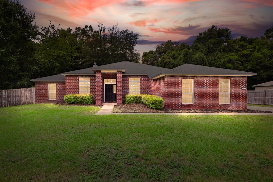 Tucked at the end of a peaceful cul-de-sac, this beautifully updated home is the kind of hidden gem that rarely hits the market. With bay glimpses from the backyard and a brand-new roof, it's move-in ready and full of charm. The water heater is a brand new 2025 unit and the HVAC was replaced in 2023!  Inside you'll find gorgeous wood floors throughout, no carpet in sight!The layout is a winner: split bedrooms for extra privacy, a spacious living room with a cozy wood-burning fireplace, and French doors that open to a bright and airy Florida room--perfect for morning coffee, game nights, or just relaxing year-round.The kitchen is ready for your inner chef, with new appliances, a central island, a roomy pantry, and tons of counter space.  There's also a breakfast nook, formal dining room, and a bonus flex space that works great as an office, playroom, or creative studio.

The primary suite feels like your own private retreat, featuring a jetted tub, dual sinks, and a walk-in shower. Two additional bedrooms share a full bath, and there's a fourth bedroom with its own ensuiteideal for guests, teens, or in-laws.

Step out back and enjoy the large yard with space to spread out, garden, or just soak in the quiet surroundings. Plenty of room for a structure or a pool!
This one checks all the boxes: space, style, location, and updates. Come see it for yourself, you'll feel right at home! 