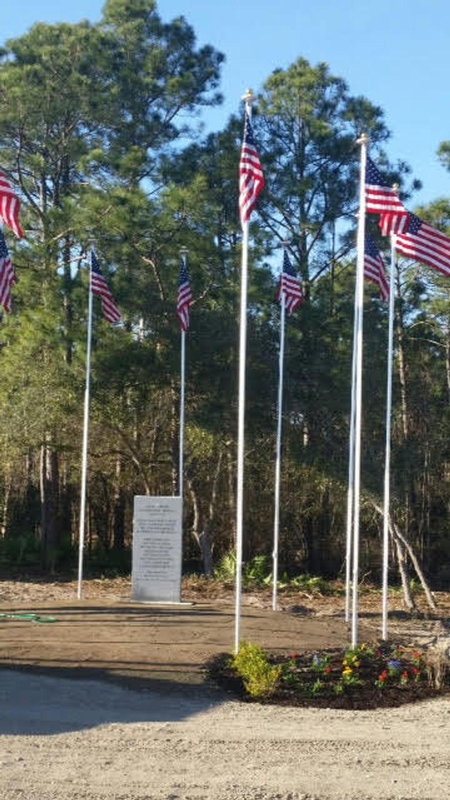 Lot includes memorial, billboard not included with sale