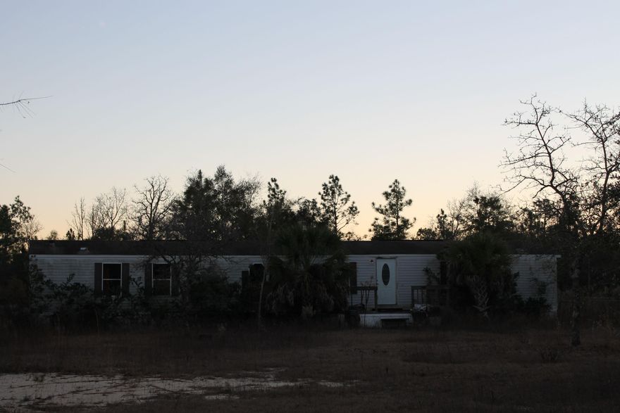 This mobile home has lots of potential. Needs some TLC. It would make a great rental investment.