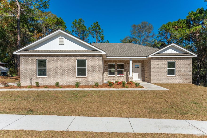 BRAND NEW - READY TO CLOSE- NORTH SIDE LOCATION - Welcome Home! Features include all brick construction, sidewalk neighborhood, decorative yard lighting, large lot (.33 acre), side entry garages, LUXURY VINYL PLANK flooring in common areas, carpet in bedrooms, quartz countertops throughout, raised ceilings, recessed lighting, ceiling fans in all bedrooms, pantry, work island with bar seating in kitchen, stainless steel appliances, white shaker cabinets, large laundry room, double vanities and walk-in closet in master bedroom.  Cozy front porch and rear patio for relaxing.  Seller will pay all buyers closing costs and prepaids (restrictions apply).  All these features and NO HOA and LOW county taxes.  Ready to move in!