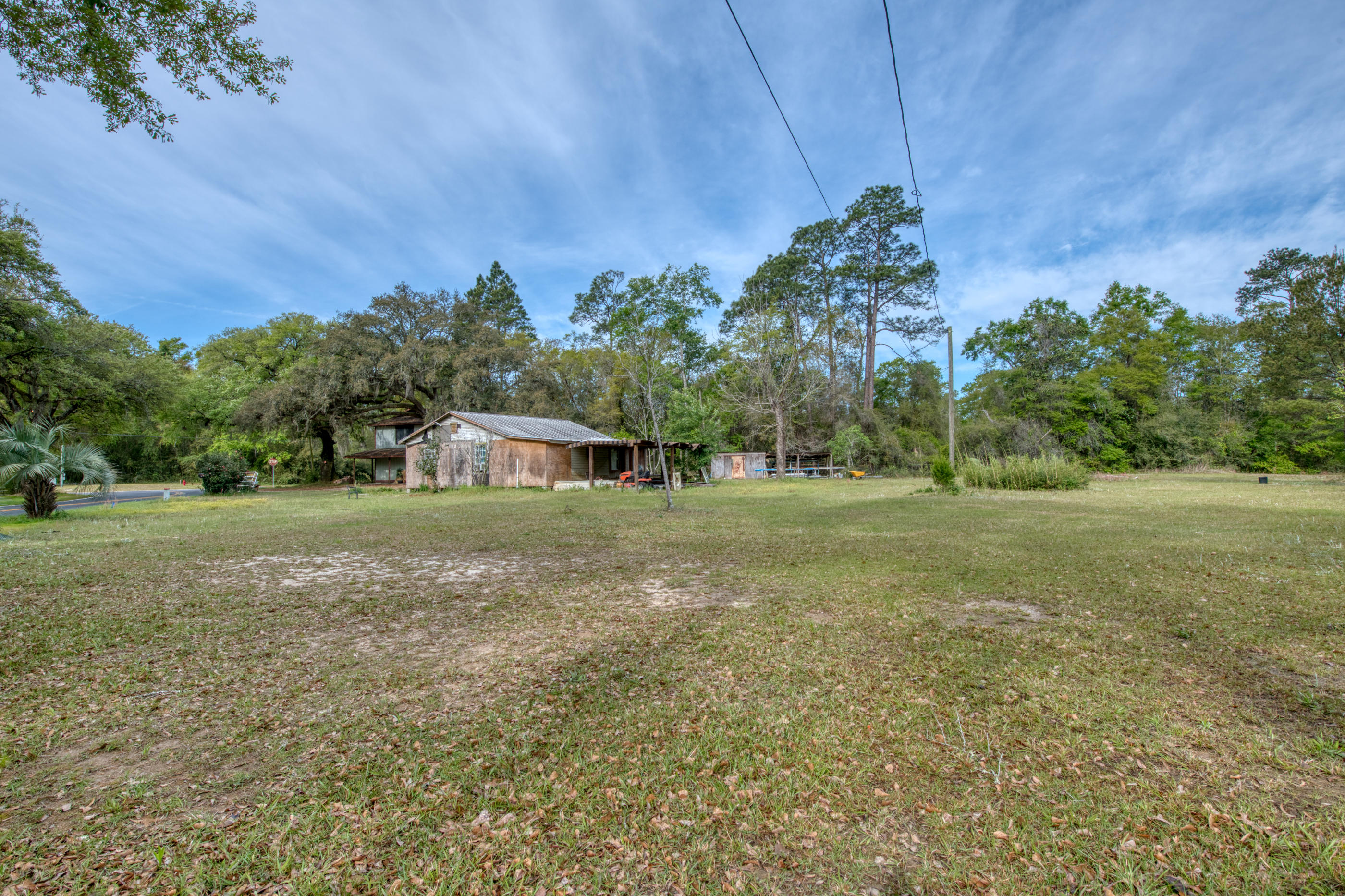 $40,000 PRICE REDUCTION! VERY motivated seller! ATTENTION BUILDERS & INVESTORS! Looking for land to serve multiple purposes? Look no further! 1.4 acres in the heart of Freeport, FL! With Highway 20 frontage, this property is an ideal location for an investment. ZONED RESIDENTIAL/NEIGHBORHOOD COMMERCIAL DISTRICT (RC), the amount of options you can build here are ENDLESS!!! Retail shops, bars, restaurants, coffee shop, bakeries, offices, spas, clinics, mini warehouses, motels, dance studios, museums, beauty parlors, pharmacy, dry cleaning, child-care facility, churches, nursing homes, antique shops, and so much more! And the best part, you can build an apartment complex on top of the first story of commercial use for MORE RENTAL INCOME! Don't let this great investment opportunity pass you b