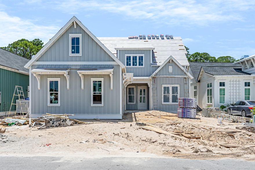 Step into refined coastal luxury with the Suffolk II, an architectural masterpiece by Romair Homes, nestled within the lakeside Powell Landing East enclave of the Watersound Origins community. Slated for completion in August 2025, this 3,297-square-foot residence offers an unparalleled blend of sophistication, comfort, and seamless indoor-outdoor living. Designed with impeccable craftsmanship, this 4-bedroom, 4.5-bathroom home features a bonus room and a 2-car side-load garage, ensuring both functionality without sacrificing curb appeal. The grand living area is anchored by a striking 60'' linear fireplace, while 16' sliding glass doors open effortlessly to the expansive covered porch, blurring the lines between interior luxury and outdoor serenity. Enjoy elevated outdoor living with the cabana & fireplace, along with the private pool & spa, a resort-style retreat in your own backyardperfect for refined gatherings or tranquil evenings under the stars. The designer-curated chef's kitchen is adorned with stained white oak cabinetry, Silestone quartz countertops, and GE Monogram integrated appliances, offering both beauty and superior performance. Throughout the home, engineered white oak flooring adds warmth and elegance, while each spa-inspired bathroom is appointed with exquisite tile selections and illuminated shower niches, elevating everyday indulgence. Upstairs, the versatile bonus room offers endless possibilities, whether envisioned as a media lounge, private office, or guest retreat. Each bedroom is a haven of comfort, featuring ensuite baths and sizeable closets. 
Experience refined coastal living in one of Watersound Origins' most sought-after neighborhoods nestled alongside Lake Powell. The Watersound Origins community offers an unparalleled lifestyle in South Walton  exceptional amenities, notoriously friendly and welcoming atmosphere, zero short-term rentals, and close proximity to all that 30A and Inlet Beach has to offer. Enjoy the zero-entry pool, playground, sports courts, and fitness center at the Village Commons, play a round of golf or foot golf at the Origins Golf Course, or take a walk along the many miles of walking and biking trails that wind all throughout the neighborhood! The new Watersound Town Center located at the entrance to the community offers several fantastic dining options (casual and formal), medical services, Starbucks, Publix, a Pavilion that hosts events year round, and more!