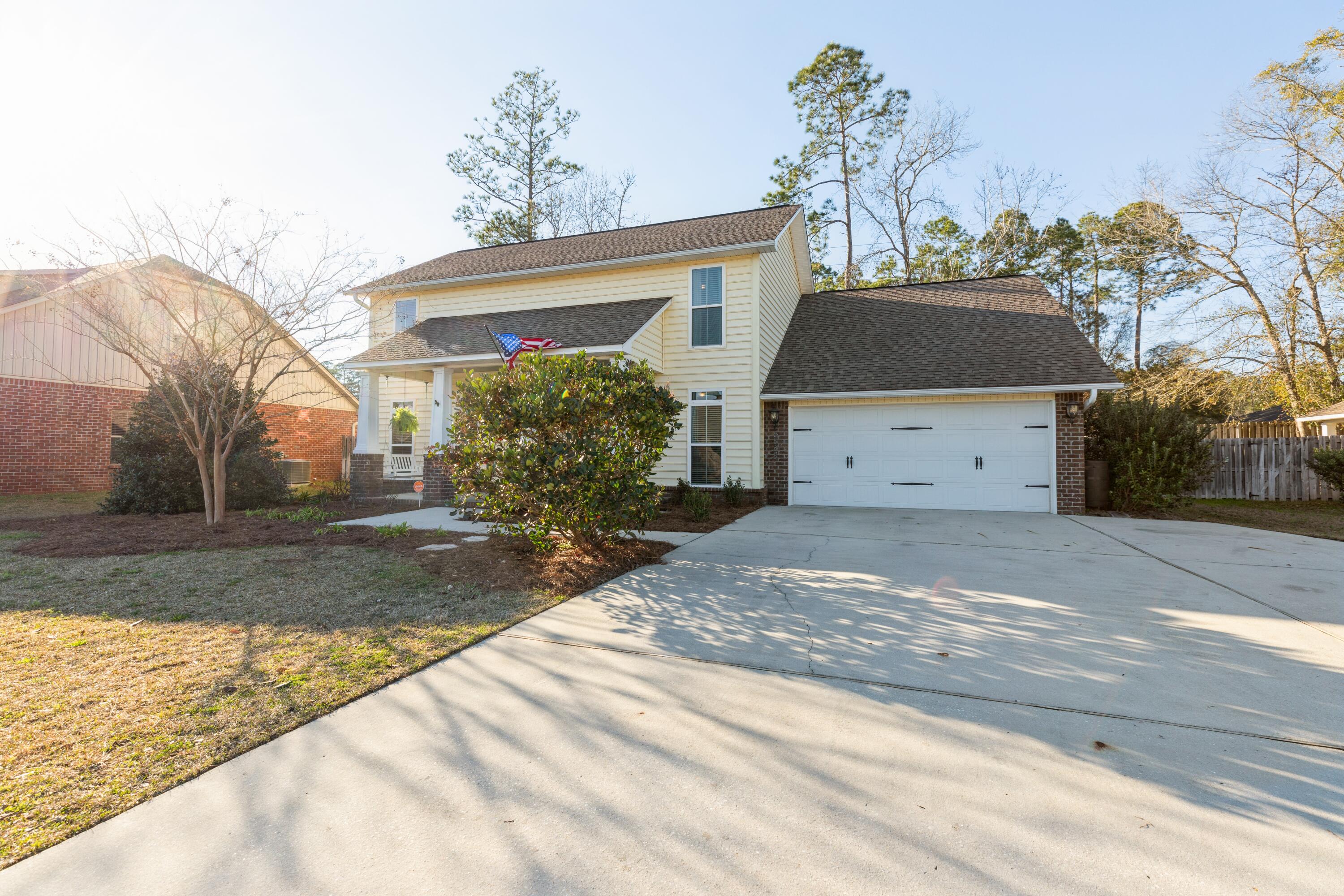 Welcome to this hands-down gorgeous home in south Crestview's Kaitlyn's Preserve! The tall foyer w/walnut wood flooring greets & leads you into the spacious living room w/trey ceiling & crown molding. Right off of the foyer is also a room that can be utilized as an office, formal dining, or playroom! In the kitchen you'll find granite counters, stainless appliances, breakfast bar w/pendant lights, & walk-in pantry. This home has neat features that set it apart: 5 1/4in baseboards, 5 panel doors, strike master plates on exterior doors, oil-rubbed bronze fixtures, tempered/hurricane rated glass windows, plus New Haven Oak laminate flooring in living room & master bedroom, and Vivint security system. French doors out to the covered back patio & fenced yard w/sprinklers. Schedule to see today!