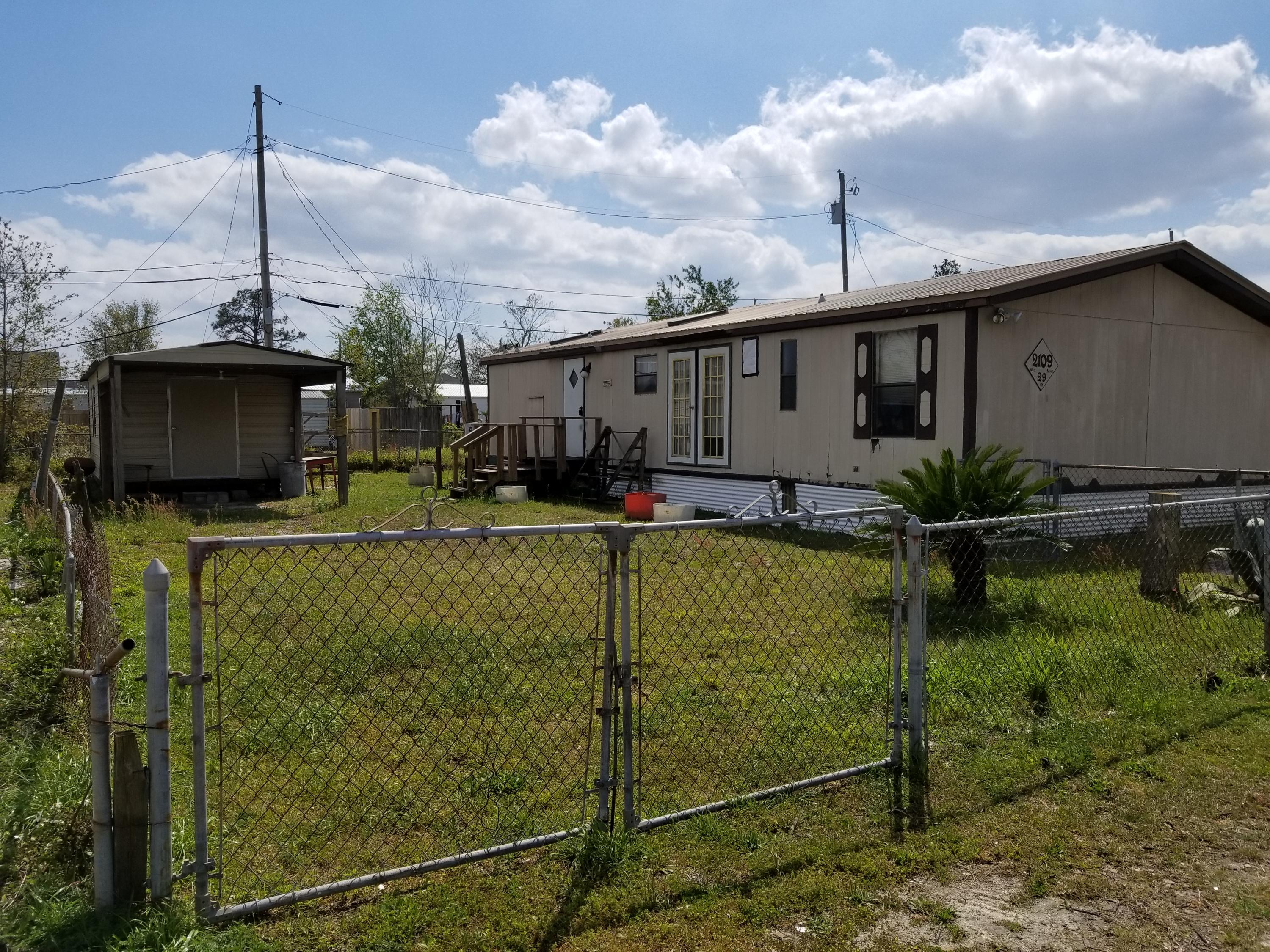 Handyman special but no hurricane damage. Incredible location - Close to doctors, hospital, grocery stores, and retail. Lot itself is a good investment. All working appliances including washer and dryer.