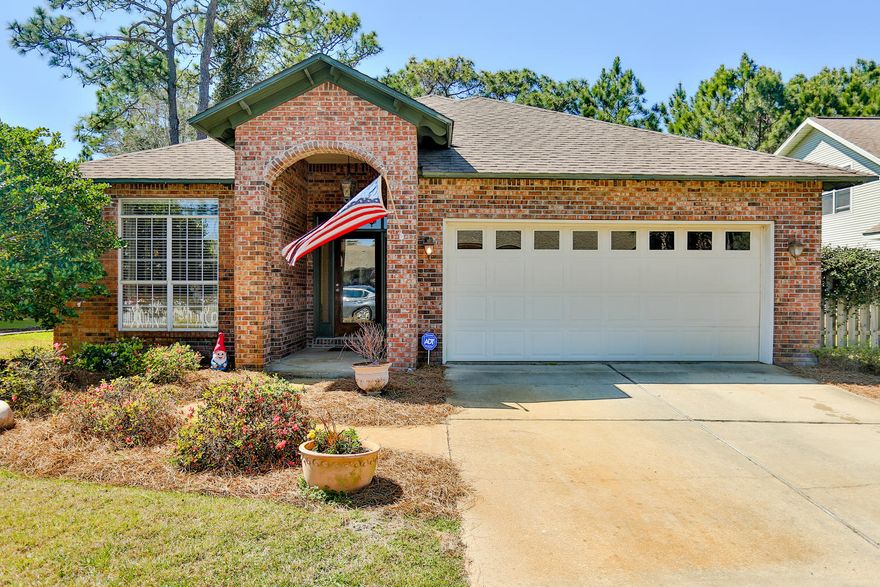 This beautiful, well maintained home sits next to the scenic walking trail leading to 30A, the elementary school, and convenient beach access and back up to state preserve. The home boasts granite countertops, chic lighting, and stainless steel appliances along with other updates. The under-cabinet lighting in the kitchen adds to the ambiance. The backyard has a screened in patio with low maintenance landscaping as well as inground sprinkler system. The neighborhood of Escada is a hidden gem located close to Grand Blvd, Publix, and Walmart. The neighborhood has a great pool, tennis courts, playground, and walking trails.