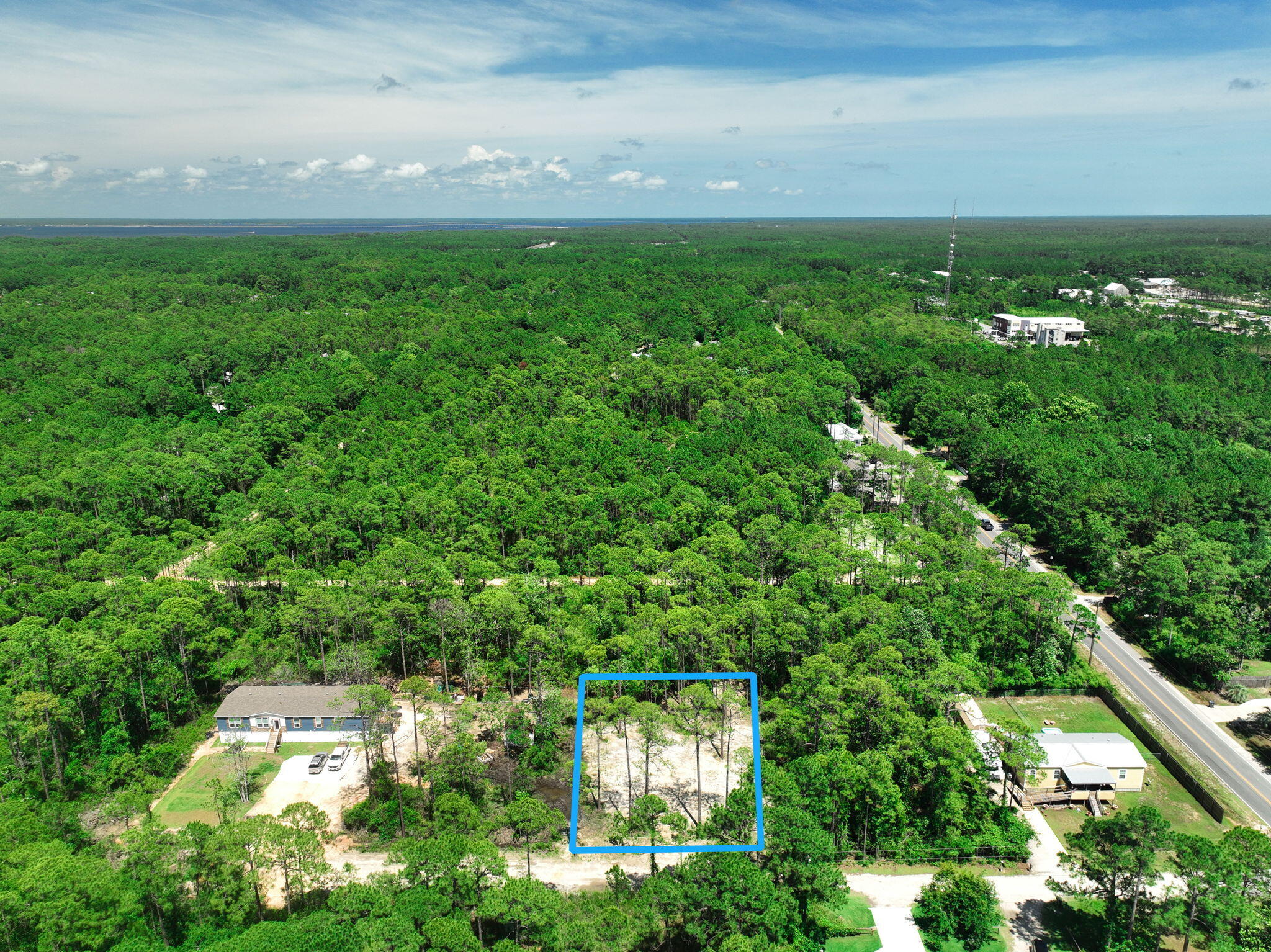 If you're looking for privacy, nature, and proximity to the water, this lot has it all. Tucked away just 2 miles north of Hwy 98, this .28-acre property offers a peaceful setting while still being conveniently close to everything Santa Rosa Beach has to offer. You're less than 4 miles from Ed Walline Beach Access and Topsail Hill Preserve State Park, and only about a mile from Cessna Landing, a county park on the bay with a boat launch, fishing, picnic areas, playground, and more. Plus, you're just minutes from grocery stores, restaurants, and local shops. Need more space? The neighborings lots (19 & 20) are also available, giving you the opportunity to own a combined half-acre to build your ideal coastal retreat. Contact us today for details!