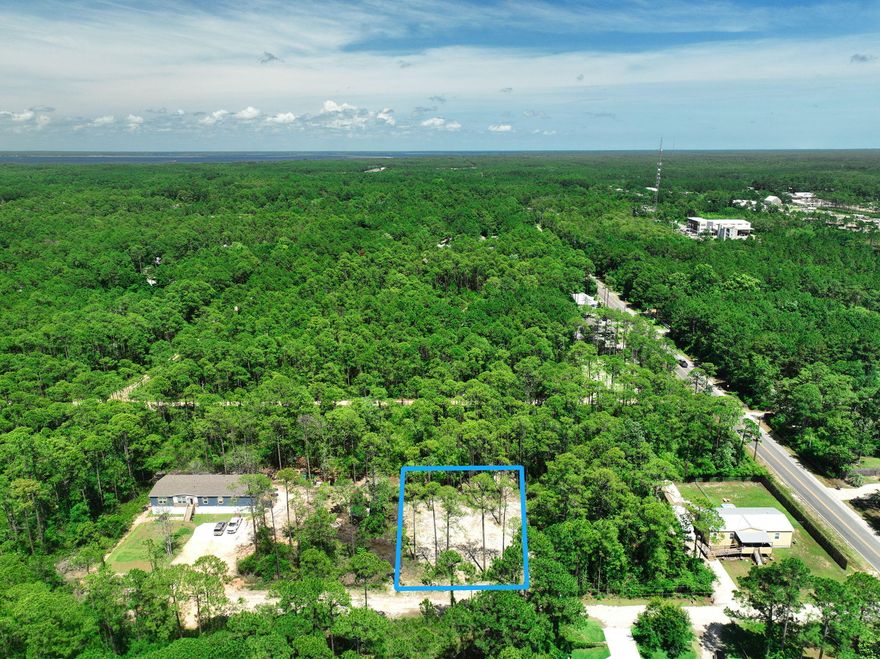 If you're looking for privacy, nature, and proximity to the water, this lot has it all. Tucked away just 2 miles north of Hwy 98, this .28-acre property offers a peaceful setting while still being conveniently close to everything Santa Rosa Beach has to offer. You're less than 4 miles from Ed Walline Beach Access and Topsail Hill Preserve State Park, and only about a mile from Cessna Landing, a county park on the bay with a boat launch, fishing, picnic areas, playground, and more. Plus, you're just minutes from grocery stores, restaurants, and local shops. Need more space? The neighborings lots (19 & 20) are also available, giving you the opportunity to own a combined half-acre to build your ideal coastal retreat. Contact us today for details!