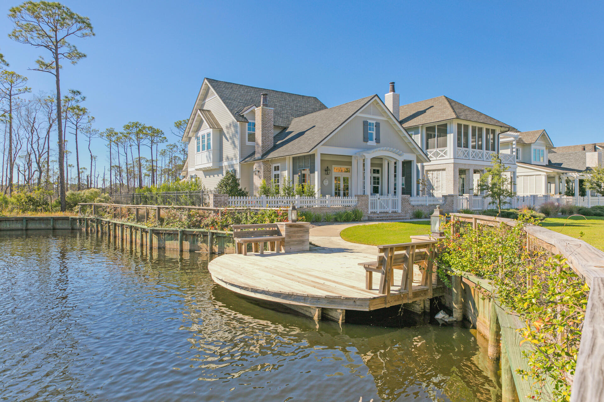 Welcome to Regatta Bay Preserve - Regatta Bay's newest development consisting of just 21 homes. This magnificent home is currently the only completed home for sale in The Preserve. Situated on the edge of the preserve and pond, this premium lot affords the utmost in privacy and serenity. As you approach you'll notice the expansive private, gated drive and The Preserve's only home with a full 3 car garage. Once inside you're equally impressed with the quality design and construction as no expense was spared on this home. The 1st floor features a large living/dining space with high vaulted ceilings and gorgeous wooden beams. The kitchen is built for entertaining with its open layout and oversized island. Everything is at your fingertips with Control 4 smart home technology throughout the