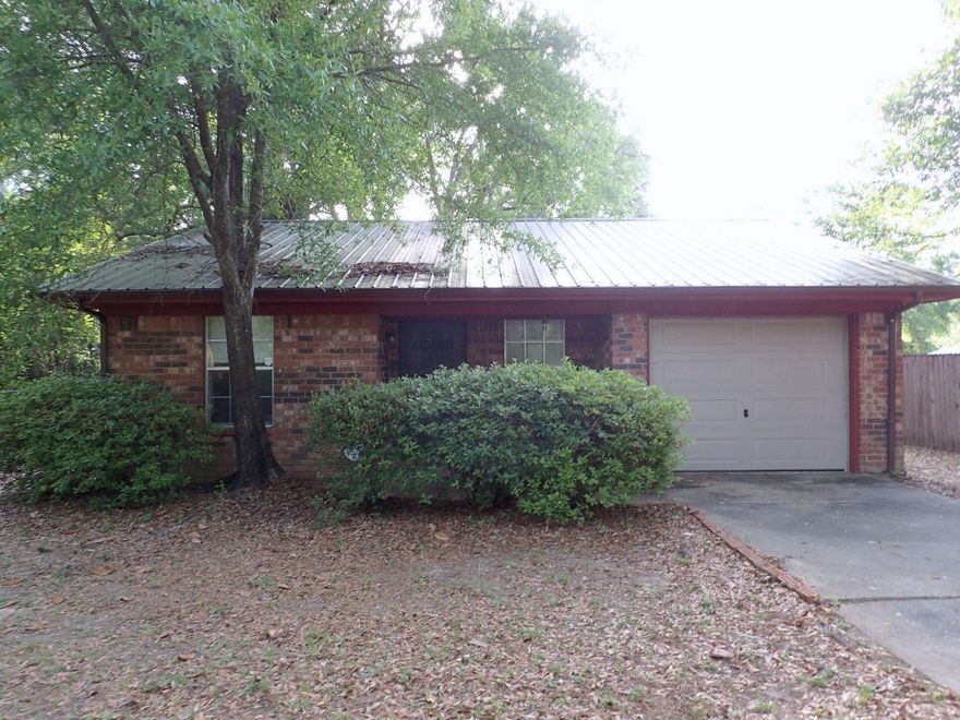 You have found a GEM with this REO property! Super cute and centrally located in Crestview, this all brick home has 1 car garage, metal roof and fenced yard. Home is just under 1000sf and has 3 bedrooms and 1 bath. Home has carpet and vinyl, and breakfast bar area and tons of potential. A must see. Call today for your showing. Sellers asking price is $42500.