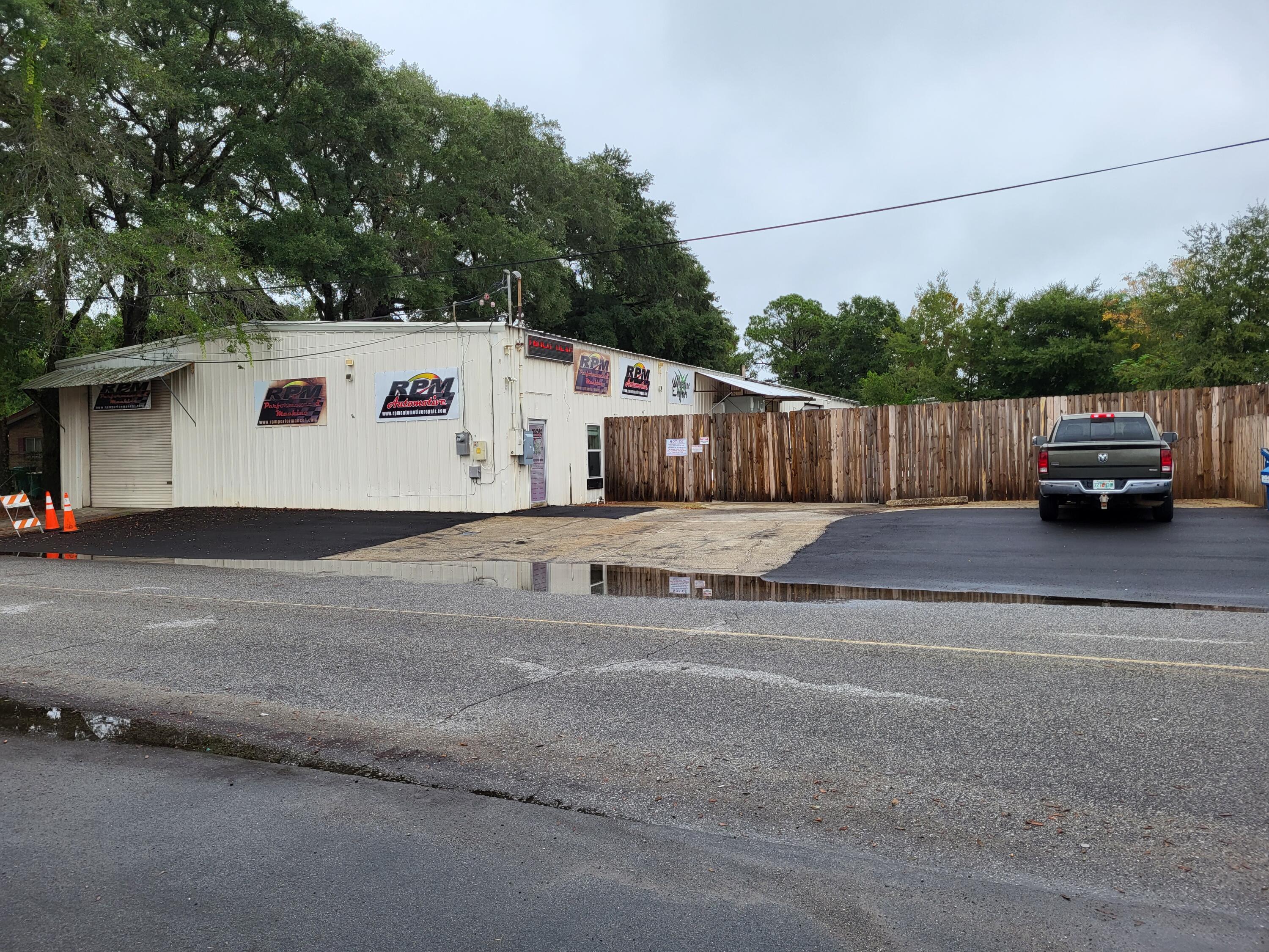 Seller financing available on this 7,440 sqft Warehouse/office in NW section of Fort Walton Beach near hospital and between Hurlburt and Eglin Air Force Base. Has natural gas and 3 phase power to the building. Has four rollup doors with one 12'x12' on front of building and 3 on side of building with two being 16' wide x 12' high and the other 14' wide x 11'6' high. Has recessed pit to work on vehicle. Warehouse area is climate controlled. 2nd floor storage above the office arear. One restroom and another stubbed out for future restroom. All metal building. Property is fenced. Do not disturb the existing tenant who is on a month to month tenancy. Call to set up an appointment to see.