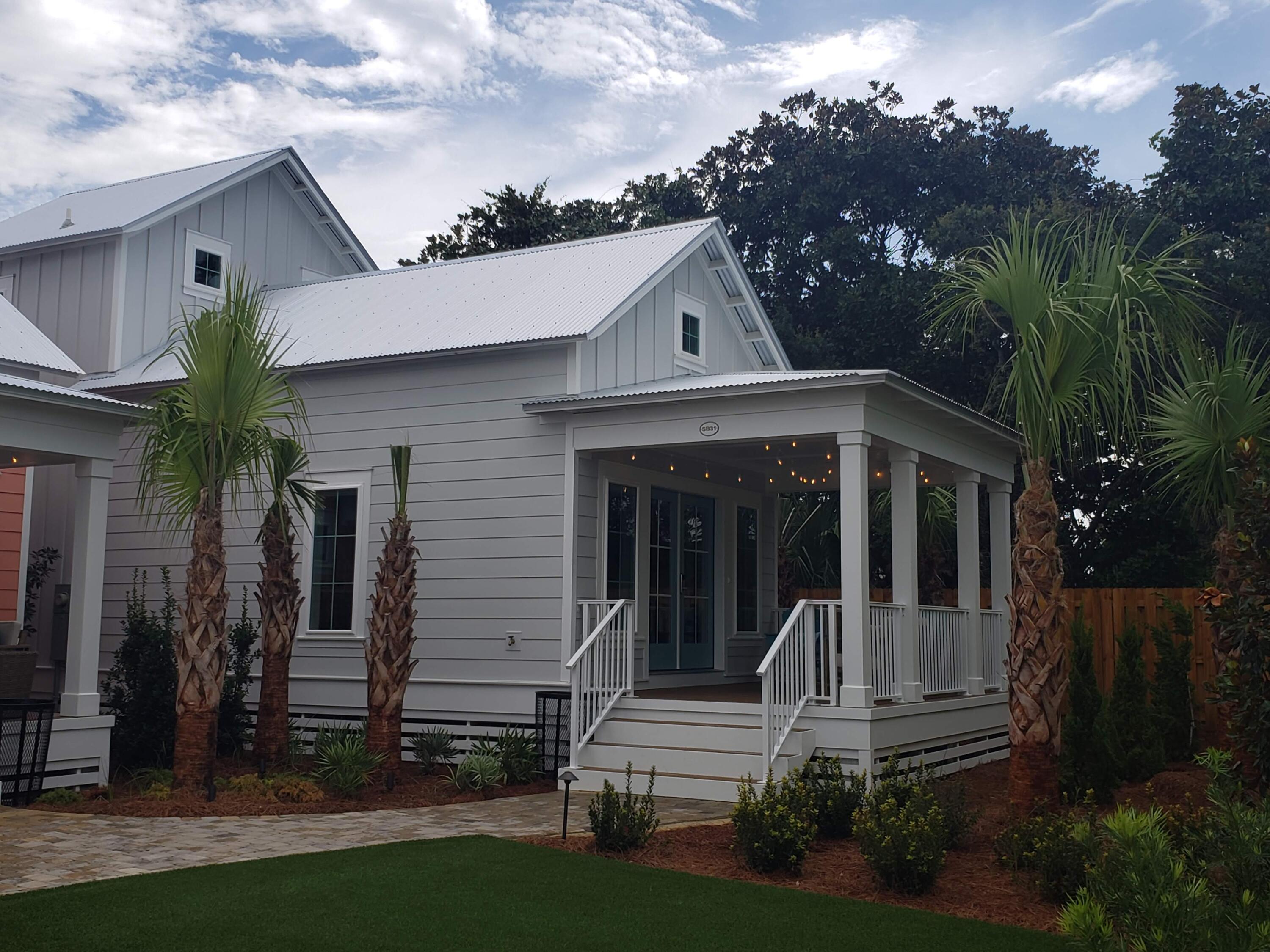 Be among the first to discover this thoughtfully curated and efficiently designed home in a charming ''surf village'' at Margaritaville Beach Cottage Resort in Panama City Beach. The Longboard plan lets you connect and gather on your front porch or step inside to explore 760 sf of heated/cooled space perfectly designed to fit your every need. These charming tiny homes feature a bedroom with a king bed and bath on the first floor and a sleeping loft with built-in full over full bunk beds on the 2nd level.