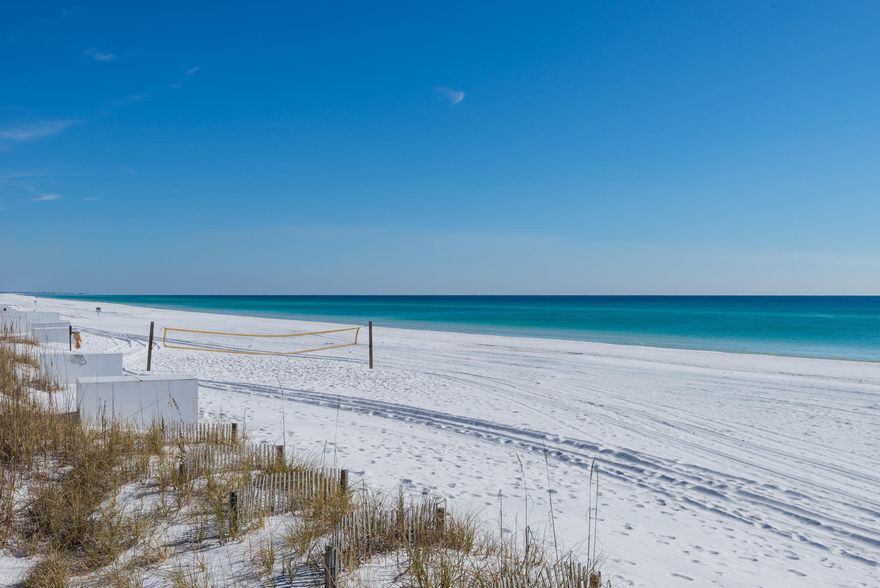 Amazing opportunity with beautiful views of the Gulf of Mexico!  This first floor 2 bedroom 2 baths in the boutique condominium building of Beach Retreat.  Overlooking 300 feet of white sand.This beautiful condo is furnished with all the essentials and is a STR/Vacation Rental w/Income Projections of 90,000 for 2021 and 79,252 already booked. Quartz counter tops white cabinets, and beautiful back splash. Beach Retreat is gated & has private beach access (deeded beach). This condo is conveniently located on the  ground floor so no stairs and you do not have to get on the elevator.  This is a low density 4 story condo with only 44 units. It has heated pool, BBQ grills, picnic area, exercise room, conference room and deeded beach area.  All dimensions must be verified by buyer