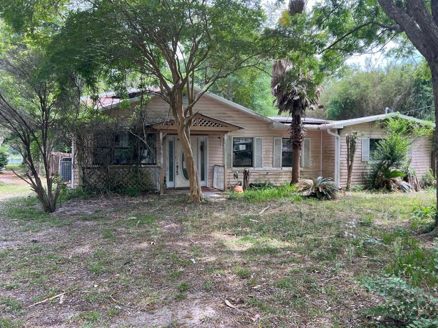 Built in 1952, this REO home is located in the heart of Pensacola and just a few miles from schools, shopping, military bases and boat launches. The home is 1164sf, mostly block walls with 3 bedrooms and 2 baths. Home is waterfront, however, only small paddle boats, shallow boats, can be set in the water due to the low water level. Home is a tear down and only cash offers along with buyer's assumption of any and all liens, fines, etc will be considered at this time.
