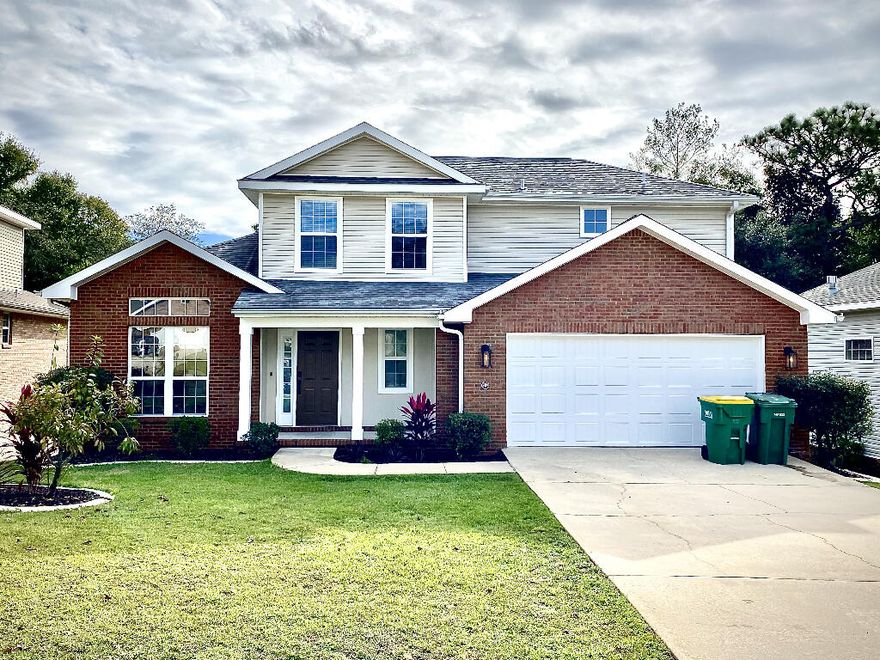 Accepting back-up offers! No HOA. Four or five bedroom, four bath with walkout basement and pool. Mother-in-law bedroom/bath option. Basement gym or bedroom with 3/4 bath  at pool deck level. Creek and hillside garden. Backs thick forested greenbelt.