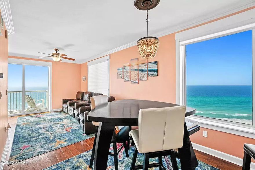 PRICE IMPROVEMENT!! 
Perfect investment second home or permanent residence. Possible Owner Financing. Grand Panama Beach Resort is one of the most desired Resorts anywhere on the Beach .This 3bed 3bath is totally renovated and immaculate. New appliances, new designer granite, All new kitchen and bathroom cabinets, new master bath shower, all wood and LVP flooring throughout. Large walk in closet in Master Bath built out with custom shelving, drawers and storage . Breath taking water views from the entire length of this condo and balcony. This one of the preferred 01 stacks. This 11th floor view allows for a totally un obstructed view . This condo has rental revenues of $67,000 in Gross Income ending 2021. This condo is a must see. Onsite Gen Store, Fitness room, 2 pools, Tiki Bars .