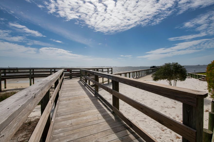 Unbelievable Intercoastal water views.Bright and open kitchen withquartz counter tops. Master bedroom with spalike bath and his and her closets, French doorsgoing out to deck. Bedrooms on the other side ofhouse can be in-law quarters. Office w 6ftglass doors, Luxury Vinyl Plank Flooring,going out to screened in large deck withincredible water views. Oversized garage withgranite grip floor covering, kitchen / craft room,powder room, and gym. Lower deck area isscreened in, also large deck with steel cable and more water views. Built in shed for added storage. Beautiful River rock lines the landscape and palm trees. Community dock with deeded boat slip recently renovated with water and electric!