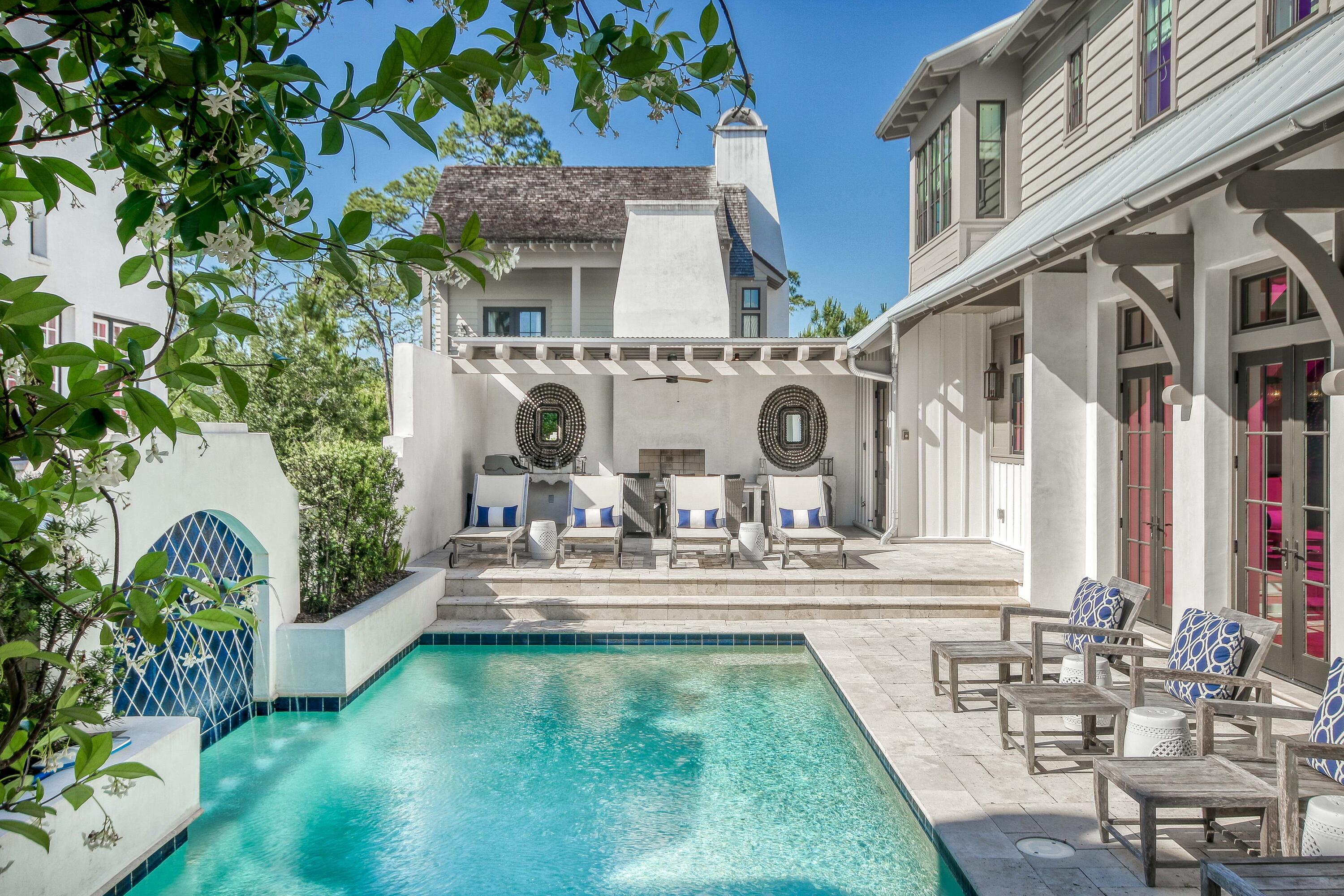 ACCEPTING BACKUP OFFERS. Coastal elegance and modern luxury find their influence throughout this custom-built 3,836 sq.ft. residence located on one of the largest, and quietest lots in Rosemary Beach. Perfect for full-time living, as it was originally designed, or as a rental investment with over $298K in projected rental income. Curated selections create a unique continuity throughout the home, and elegant, tasteful finishes won't require an update. The first floor features an open and airy 2-story living/diving area with stone flooring, and a large eat-in kitchen with custom cabinets, wire-brushed oak flooring, a butler's pantry, and mudroom. This open first floor space leads out to the peaceful courtyard with an oversized pool, lounging area, and covered dining
