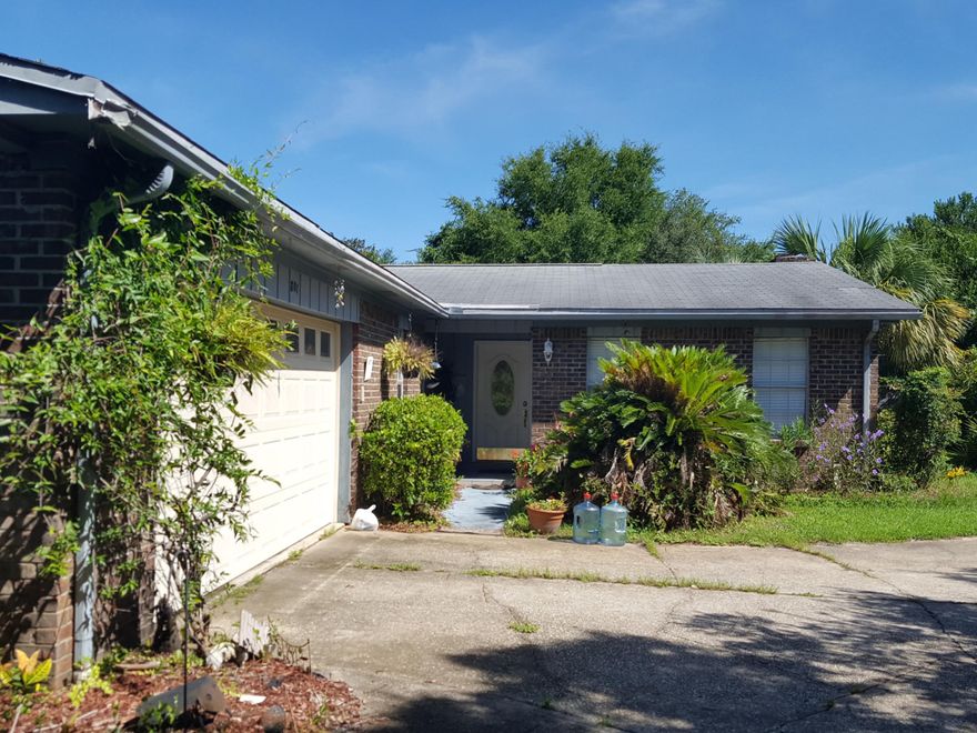 This house has great potential. This 3 bedroom 2 bath home sets on over a half acre corner lot with room to add a large shop or place to park your RV. The house has an open floor plan with a large kitchen living room and dinning room. The master bath features a double vanity and has potential for a large walk in shower.