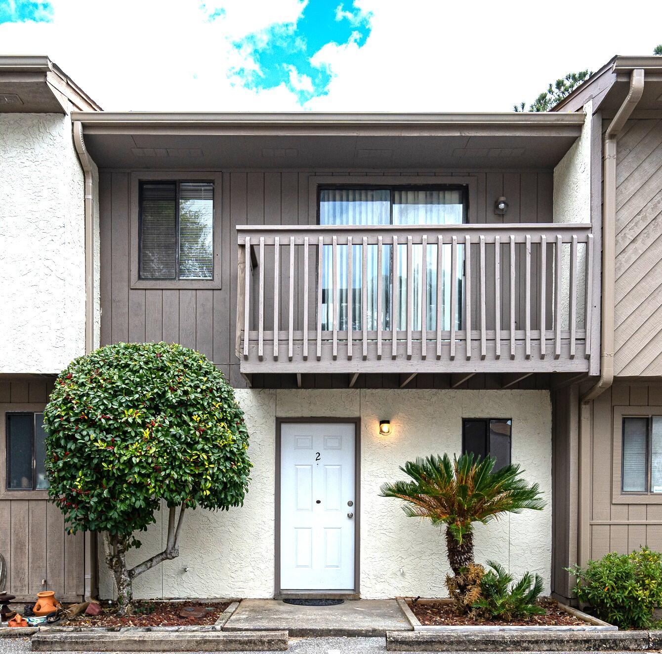 Brand new appliances, new countertops, lighting, ceiling fans, walls freshly painted, new doors, all ceilings redone, and there's a new storm door. If you want to own instead of rent, this is your opportunity! Downtown location with easy access to shopping, restaurants and the beach! This townhome has a full bathroom downstairs, convenient for showering off after those days you're fresh from the beach, or just out of the community pool. Updated kitchen opens up to the living/dining room via a breakfast bar. Upstairs, both generous bedrooms share the full bathroom, and upstairs laundry! Primary bedroom has double closet and a balcony. Second bedroom has dressing area and overlooks the deep fenced in back yard. Buyer to verify all information deemed important.