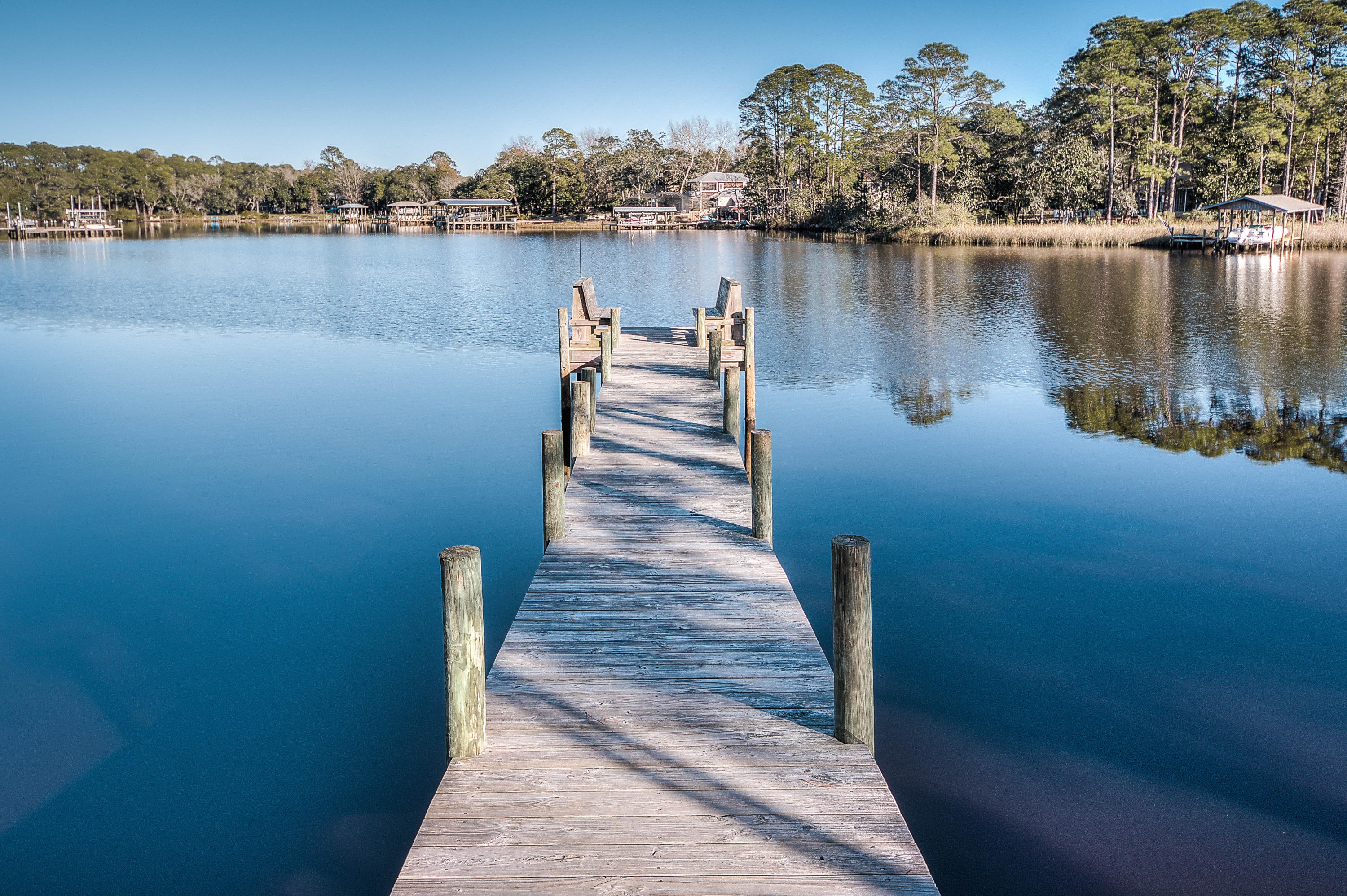Premium lot located in Botany Bayou with a traditional neighborhood feel, winding streets and upscale custom homes, community pool, community dock on the bay and gated access. This oversized 105x140 offers plenty of building options and backs up to forest/conservation area for ultimate in privacy. Located close to Scenic Hwy 30A, Sandestin, Grand Blvd and Silversands outlets with multiple restaurants, shopping and entertainment options for tastes. With easy access to the world famous Beaches of South Walton, this is the perfect lot to build your dream home.Buyer to verify all information important to buyer.