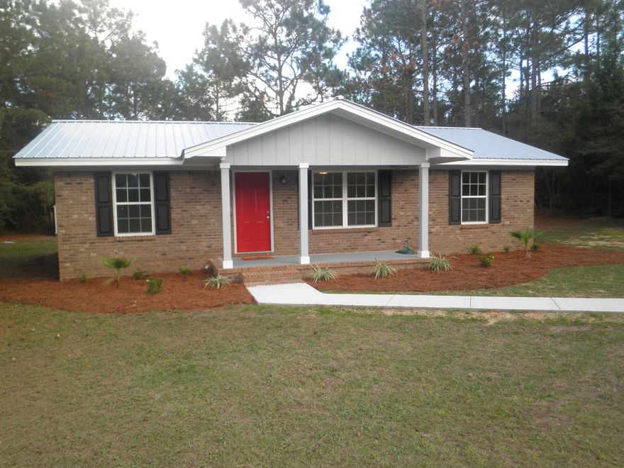 Charming, 3 bedroom 1 bath, newly remodeled all brick home south of I-10, in DeFuniak Springs. Large 0.82 acre lot located on a paved road. New windows and doors have been installed throughout, along with ceramic tile flooring. The kitchen offers all new appliances with tile marble backsplash and new countertops. All interior has been freshly painted. New light fixtures and ceiling fans throughout the home. A metal roof was put on this year as well. Great sized two story workshop/storage attic located on the back of the property as well as a storage shed.